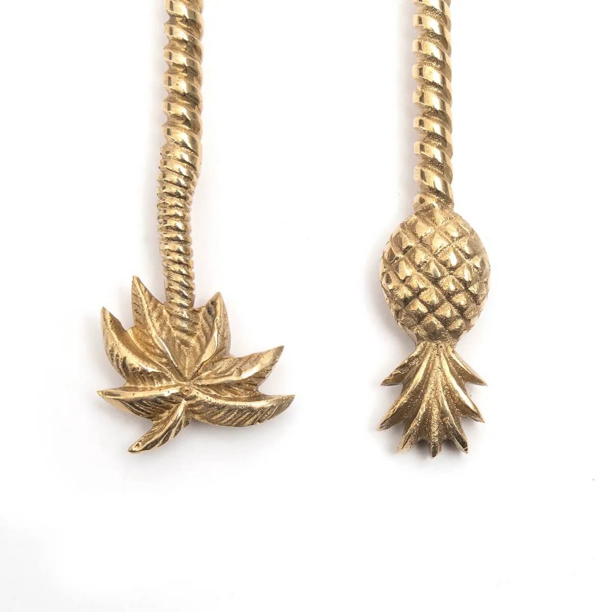 Bohemian style gold forks with pineapple and palm details, made of solid brass, perfect for an elegant tropical dining experience.