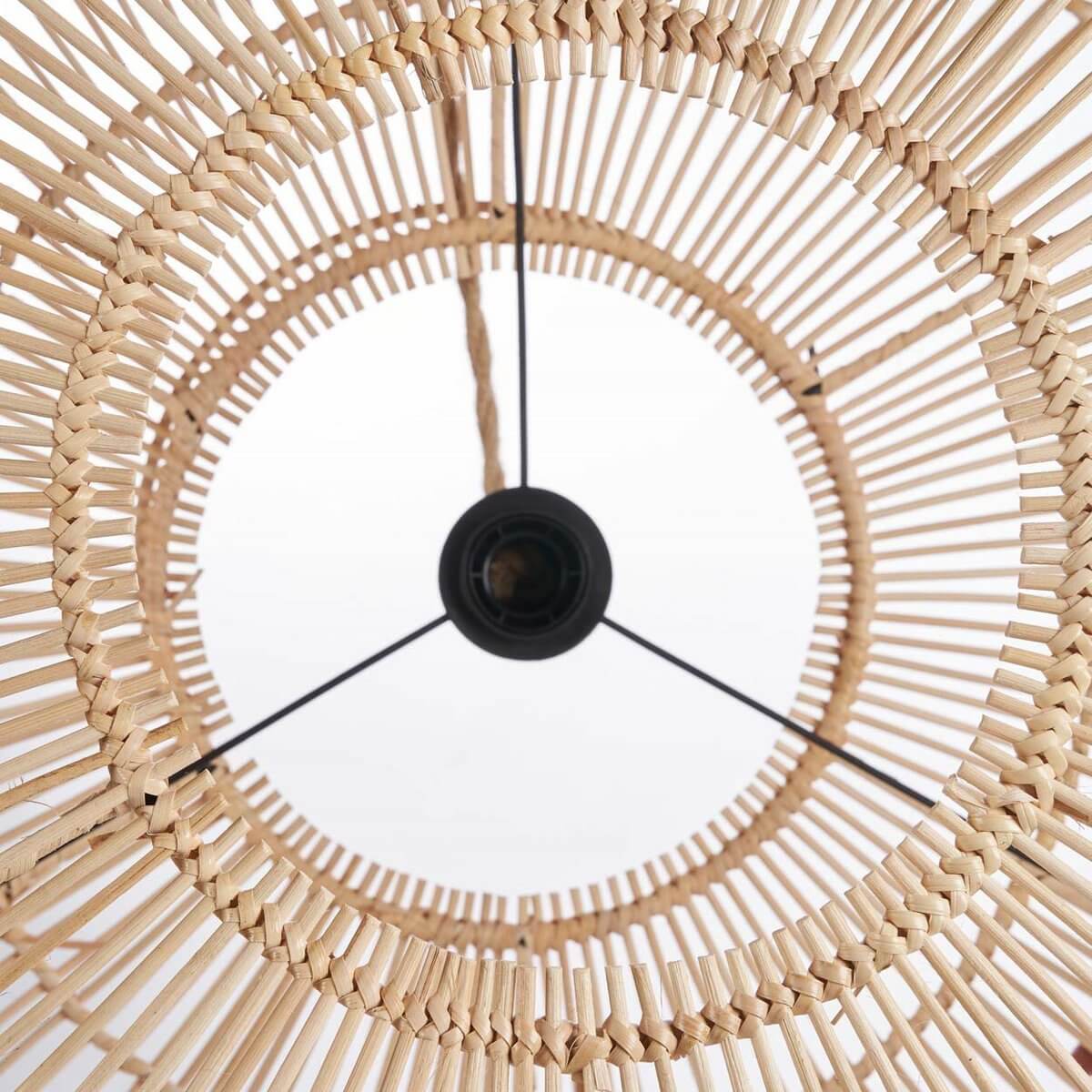Top view of The Arun Pendel made from natural rattan, showcasing its bohemian style and intricate handwoven pattern.
