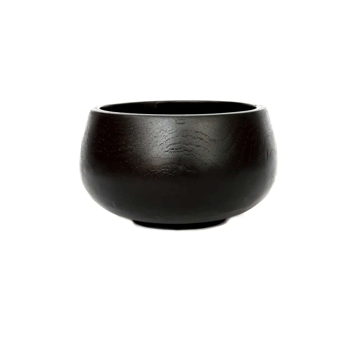 De Bondi Black Bowl in teak, a versatile Bohemian accessory for storing items or serving appetizers, with a sleek, handmade design.