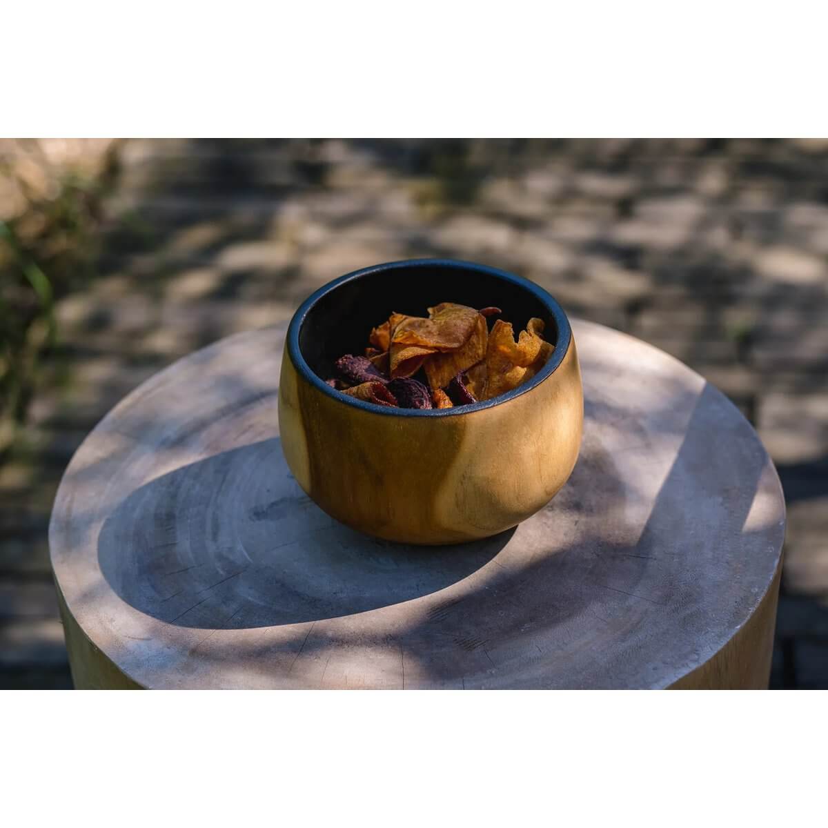 Stylish Bohemian De Bondi Bowl made of teak, perfect for holding snacks, makeup, or accessories. A versatile interior piece.