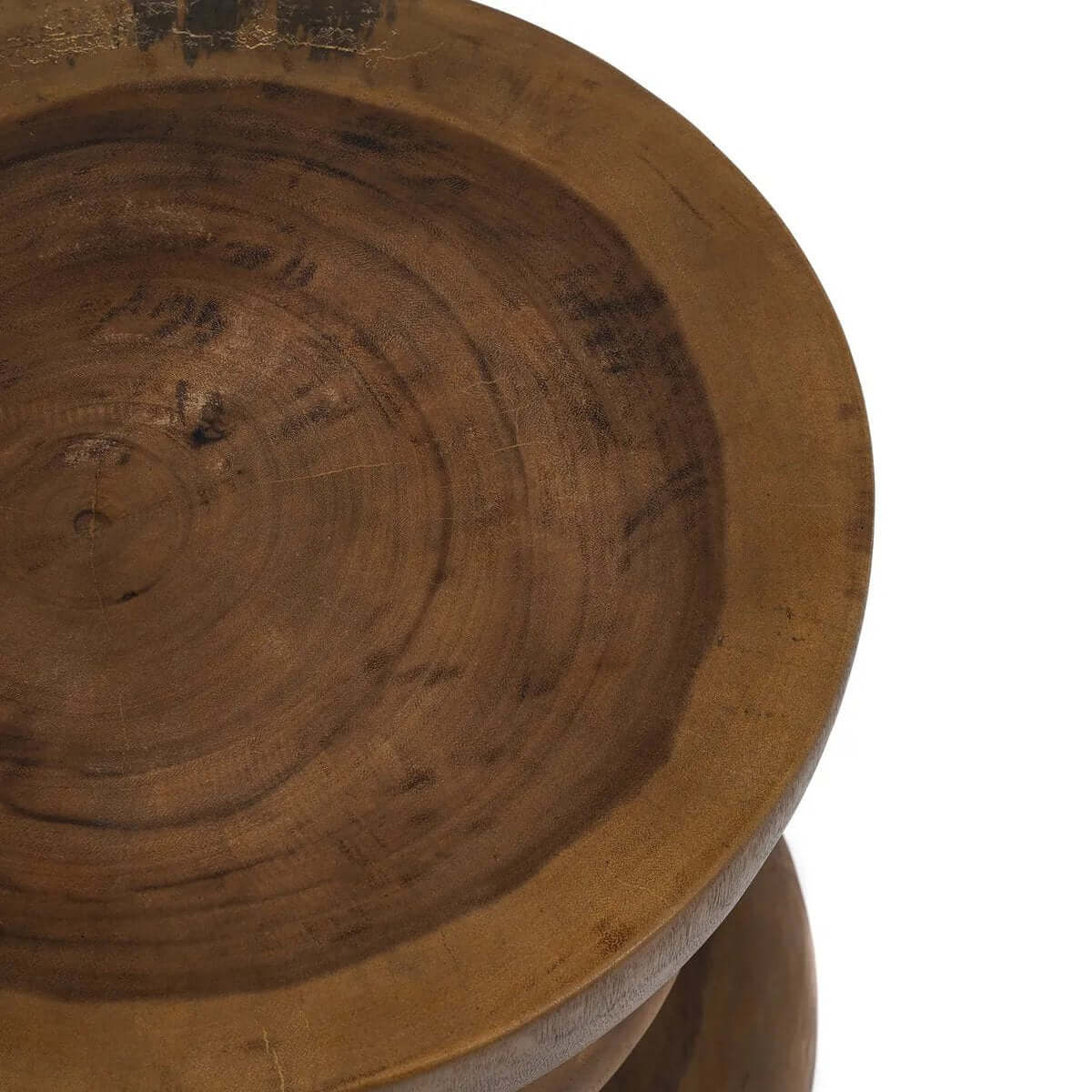 Close-up of the De Corfu-kruk, a bohemian spiral-shaped stool made from solid Mungurr wood, perfect as a side table or in various rooms.
