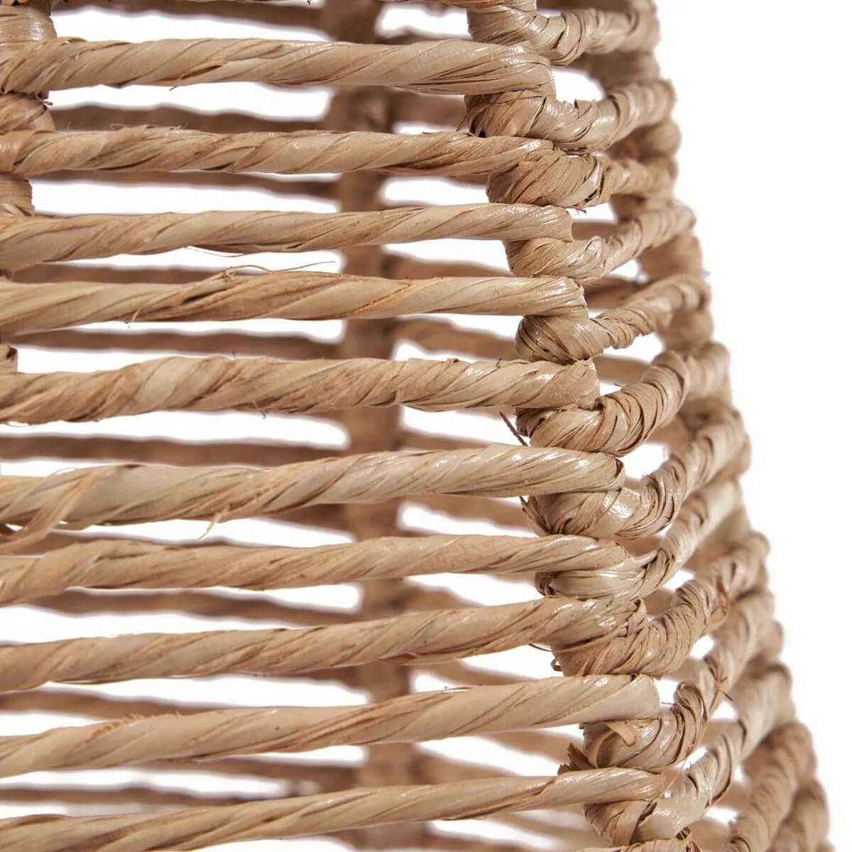Close-up of a bohemian-style De Fini Hanger S in natural rattan, showcasing its intricate weave and organic texture.