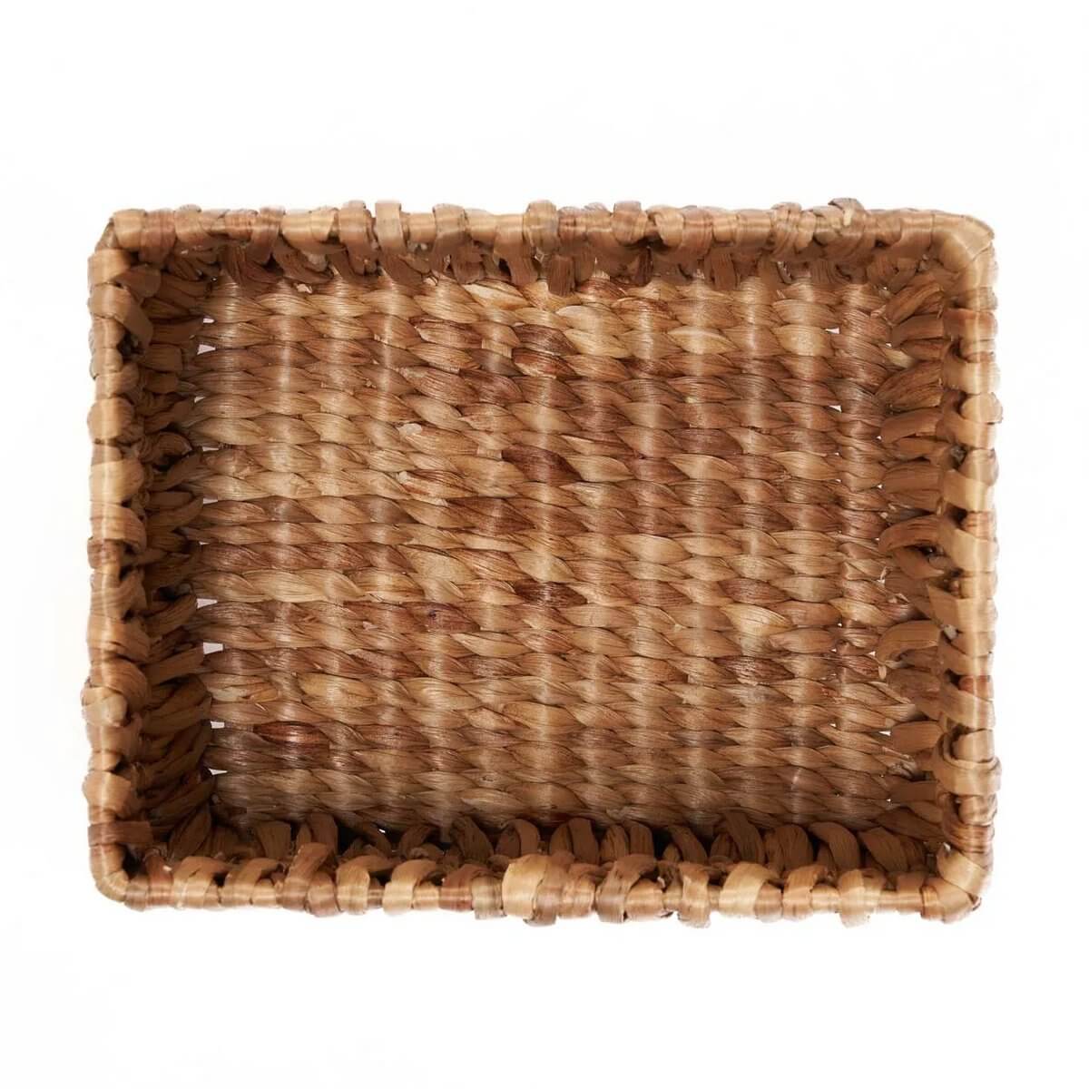 Bohemian-style Akuku Basket, handwoven from natural banana leaf, ideal for rustic home storage of fruits, towels, or magazines.