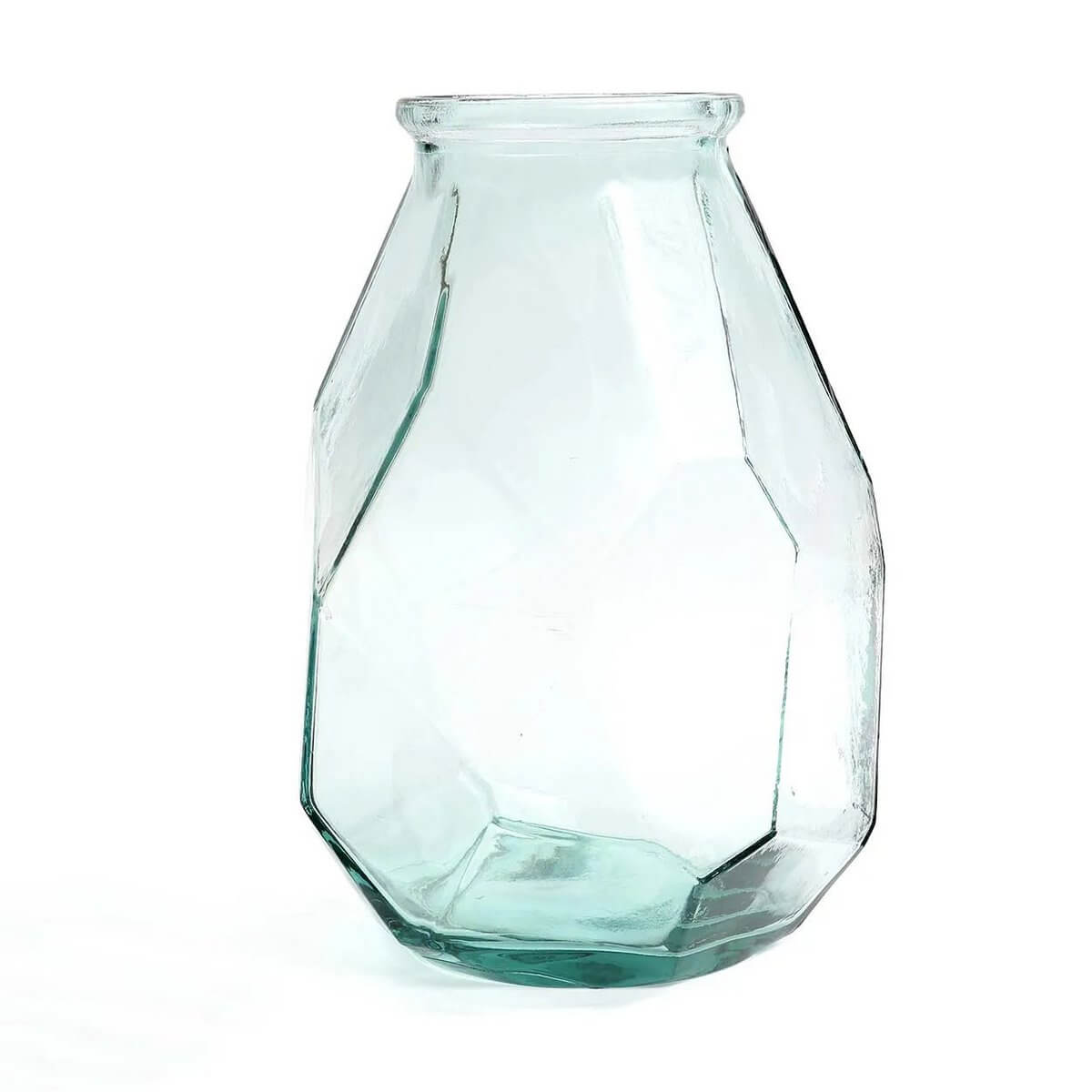 Clear geometric glass vase with angular lines, inspired by intricate origami, perfect for a bohemian modern decor aesthetic.