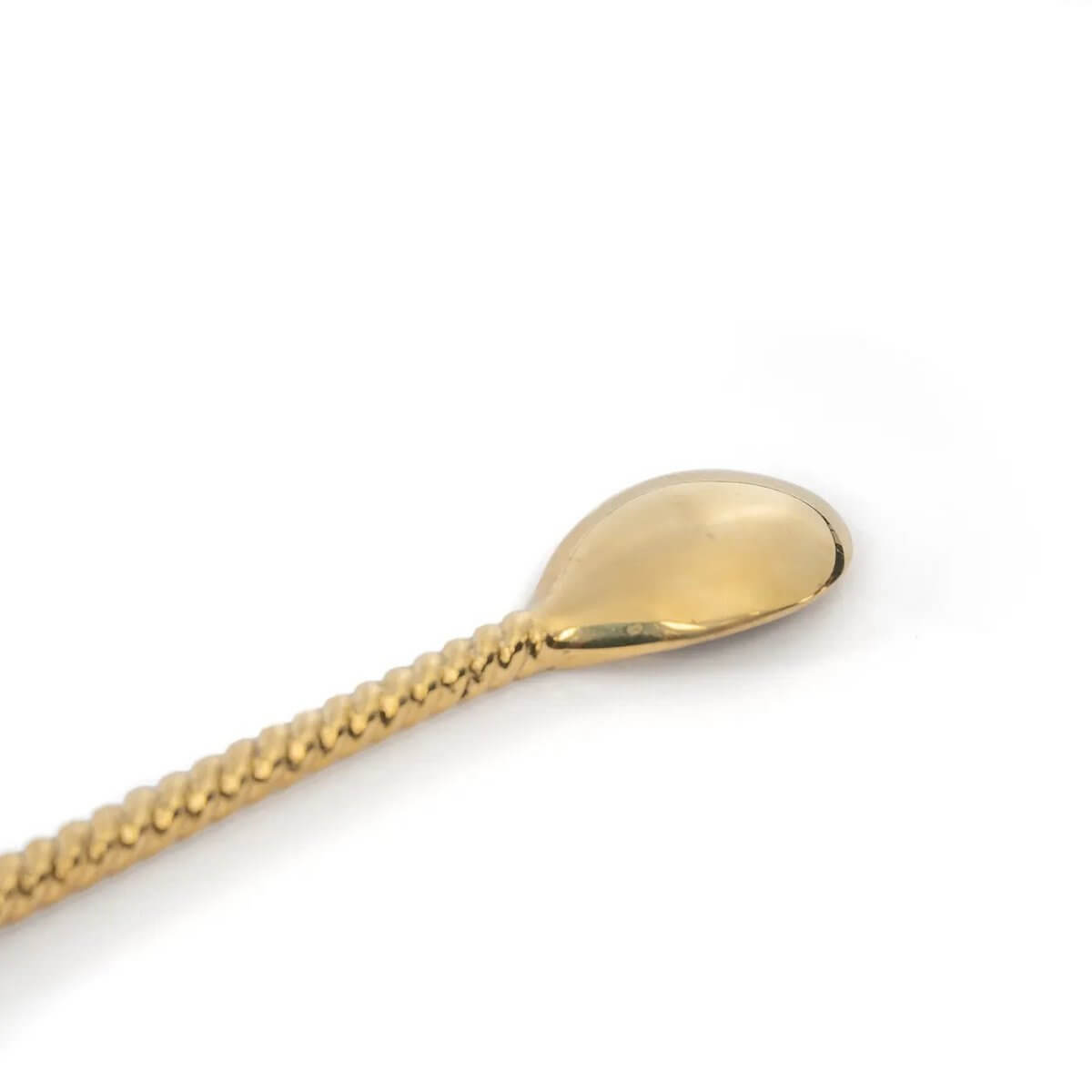 Bohemian gold De Palmboom long spoon with intricate detailing, crafted from solid brass for a luxurious dining experience.