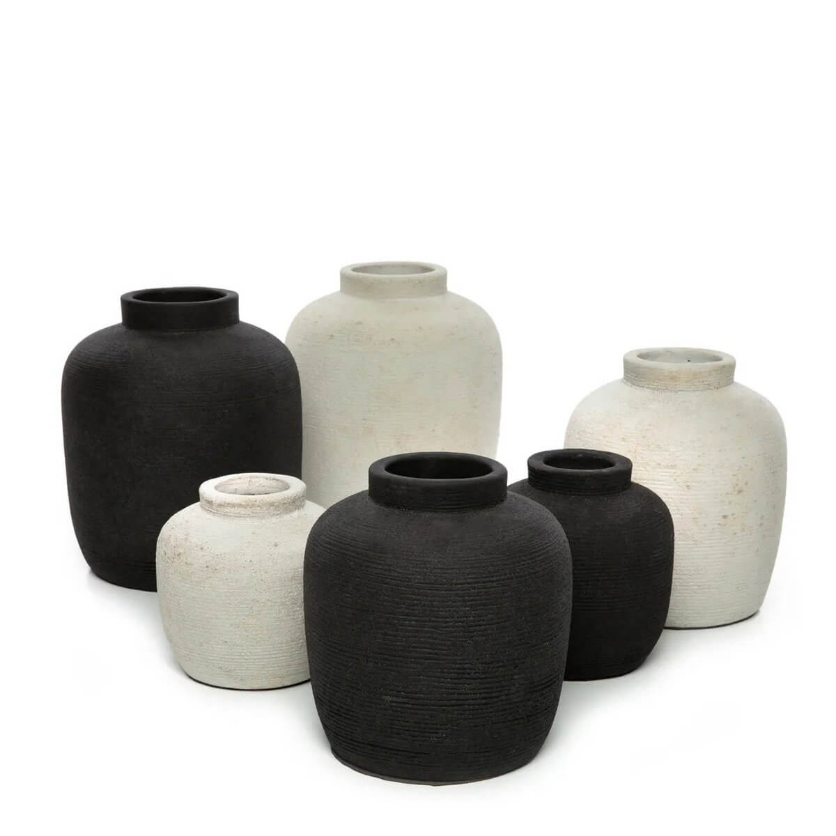 Set of black and white Peaky terracotta Bohemian vases in medium size, ideal for adding charm to home decor with dried or fresh flowers.