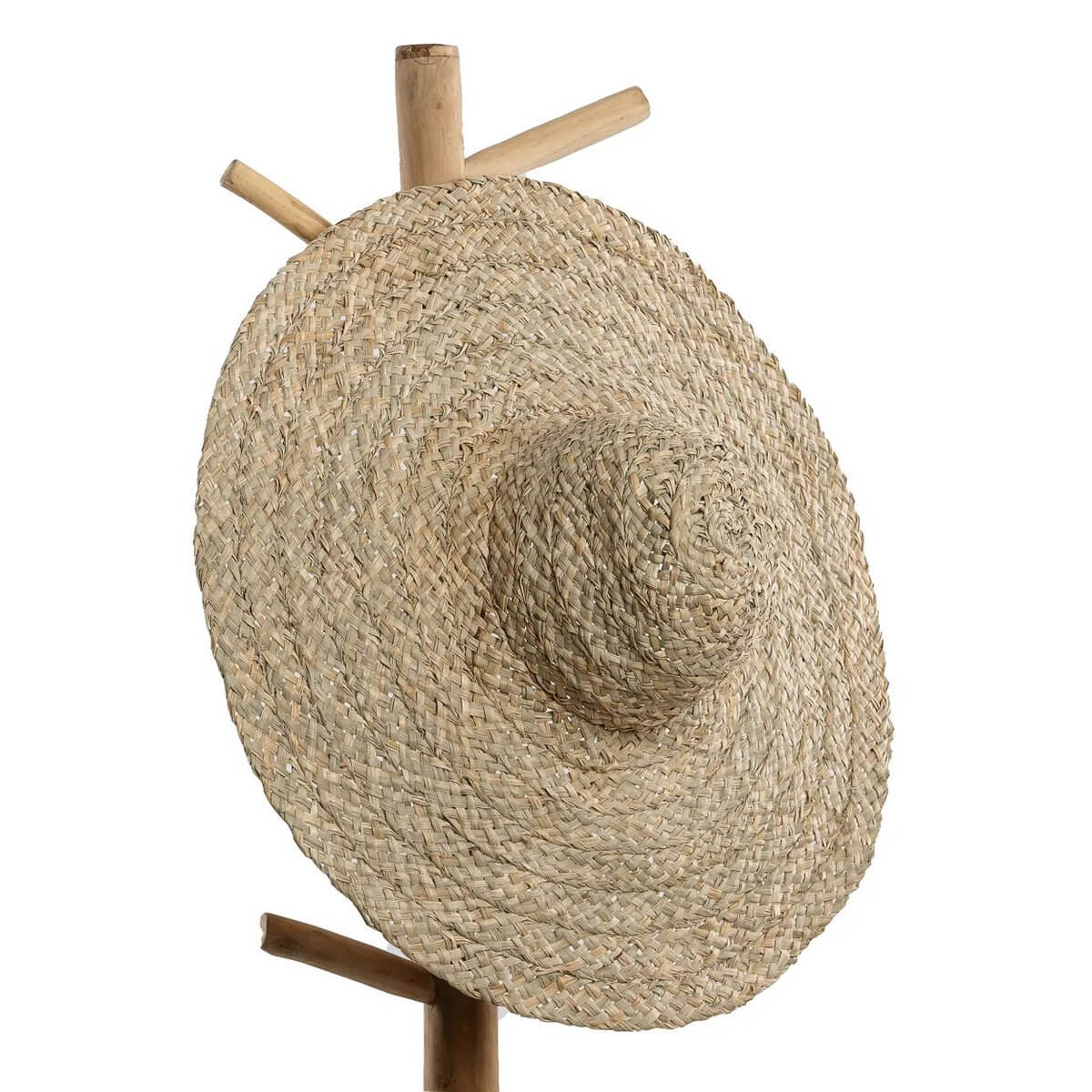 Bohemian De Playa hat in beige made from 100% water hyacinth on a wooden stand, perfect for stylish summer days.