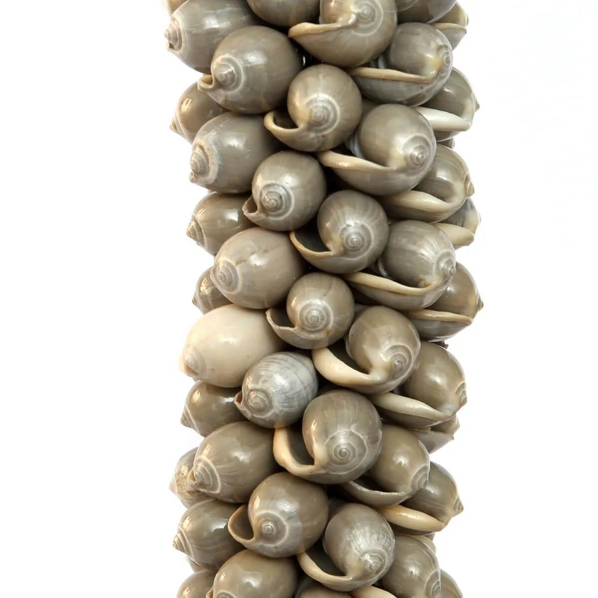 Close-up of a grey shell hanger handcrafted from cotton and shells, adding a bohemian touch to decor from Bazar Bizar Living.