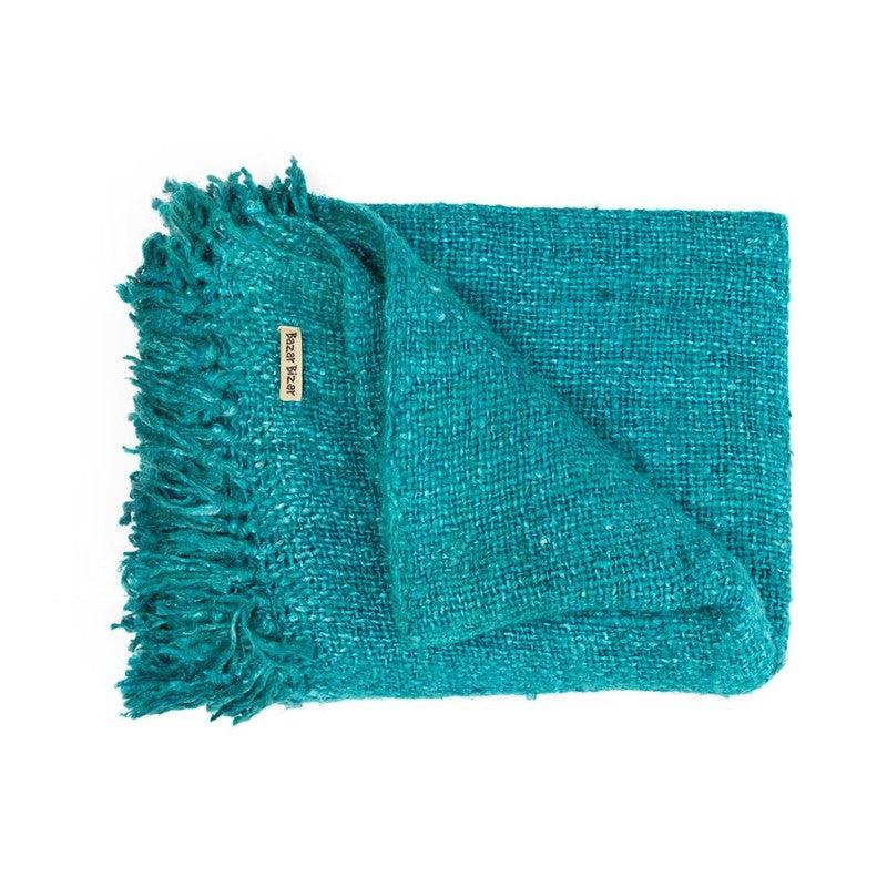 Luxe handgeweven aqua katoenen plaid met franjes, gewafelde structuur en zijde look, perfect om sfeer te creëren.