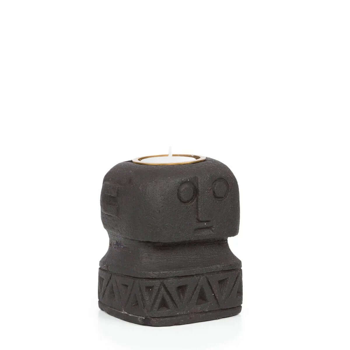 Hand-carved Bohemian Sumba stone candle holder from Indonesia, featuring unique tribal design perfect for eclectic decor.