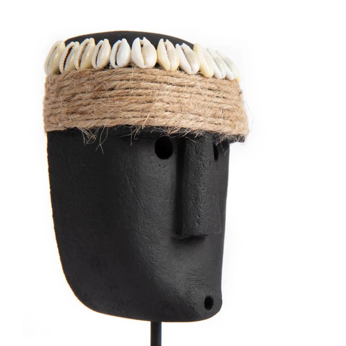 Bohemian Sumba stone statue on stand with shell and twine headdress, handcrafted in Indonesia. Traditional protection charm.