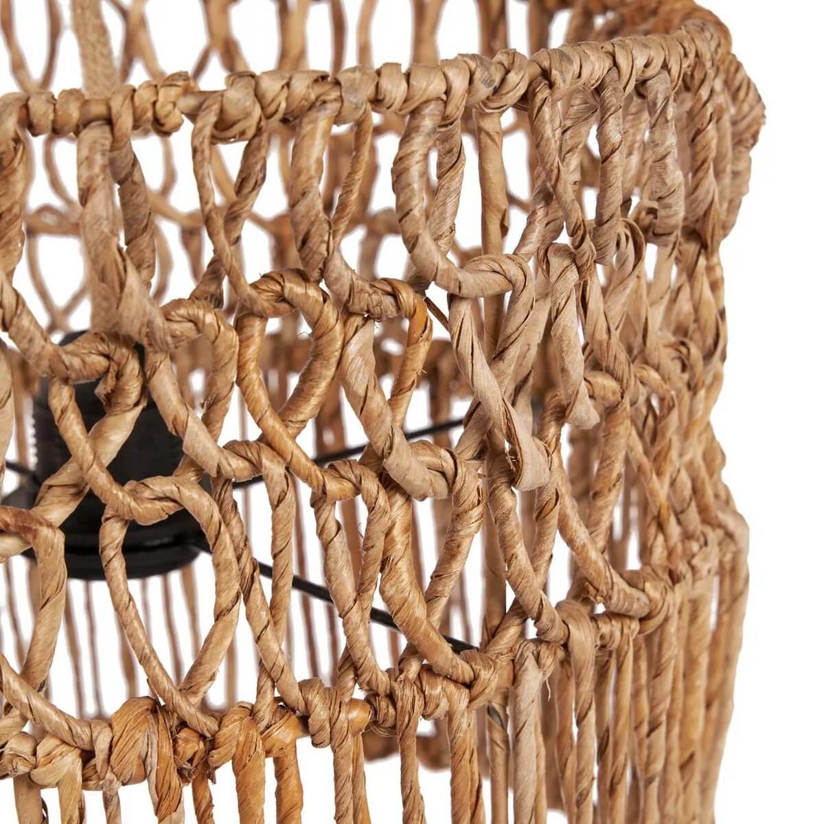 Close-up of a Bohemian-style handmade lamp crafted from banana leaf, showcasing intricate weaving in earthy tones.