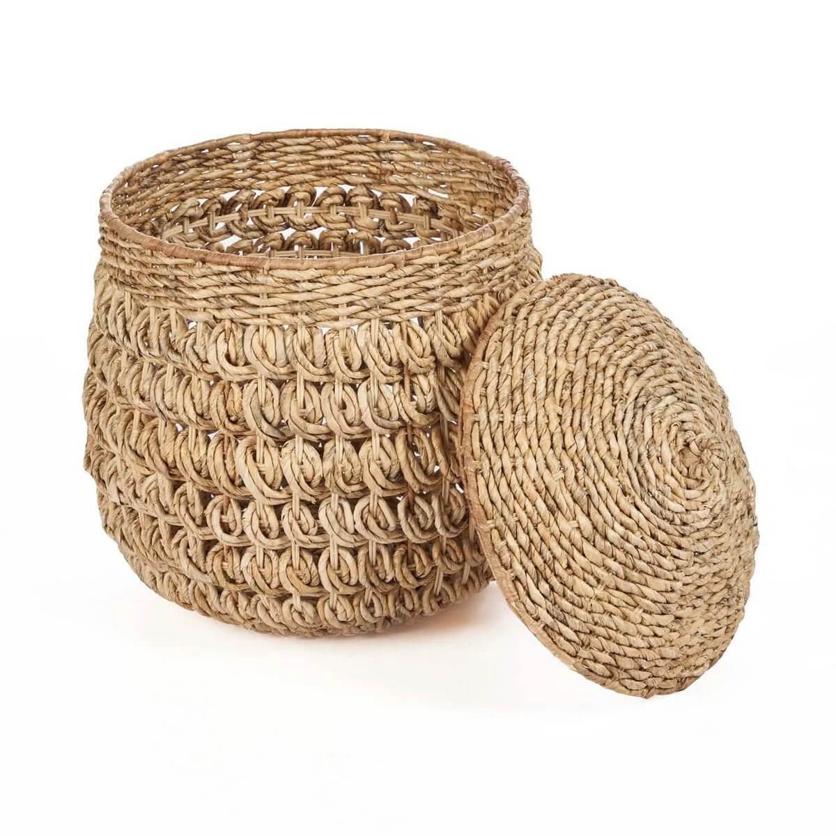Handmade bohemian Tarajih basket with lid, crafted from natural banana leaf for cozy home decor.