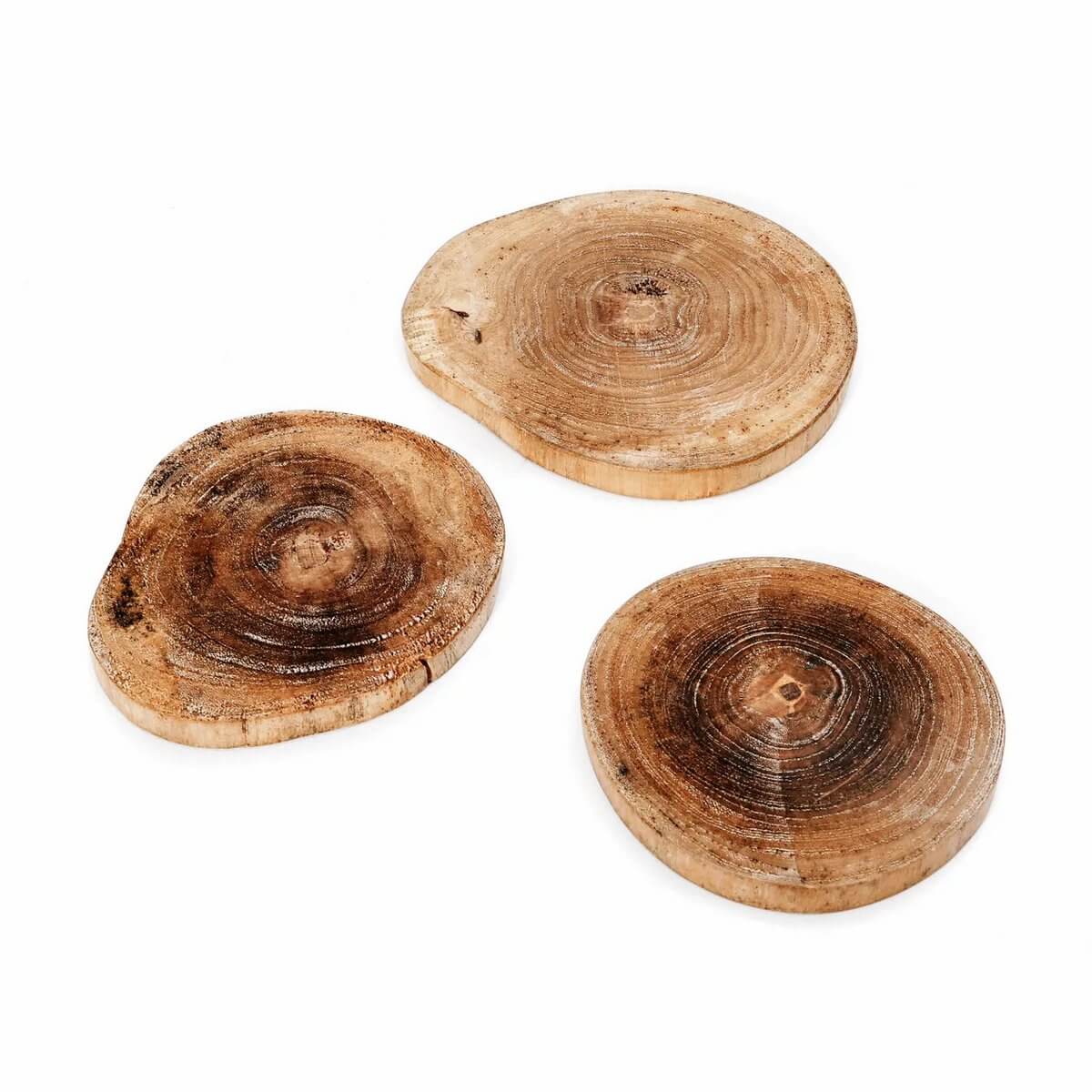 Bohemian style teak root coasters enhancing your table's allure, crafted for natural elegance and versatility. Perfect for any decor.