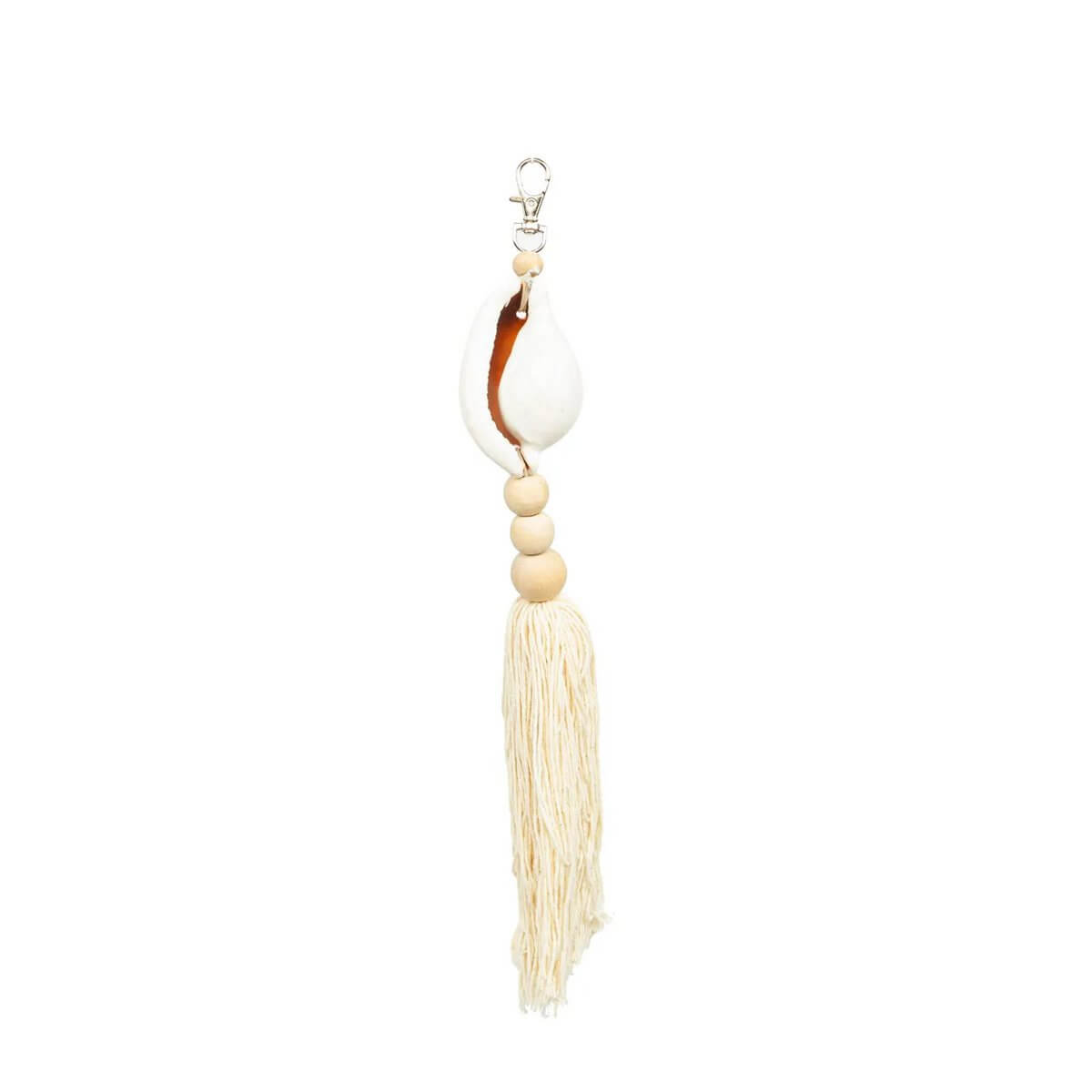 Bohemian white keychain with large shell, wood, and cotton tassel from Bazar Bizar Living.