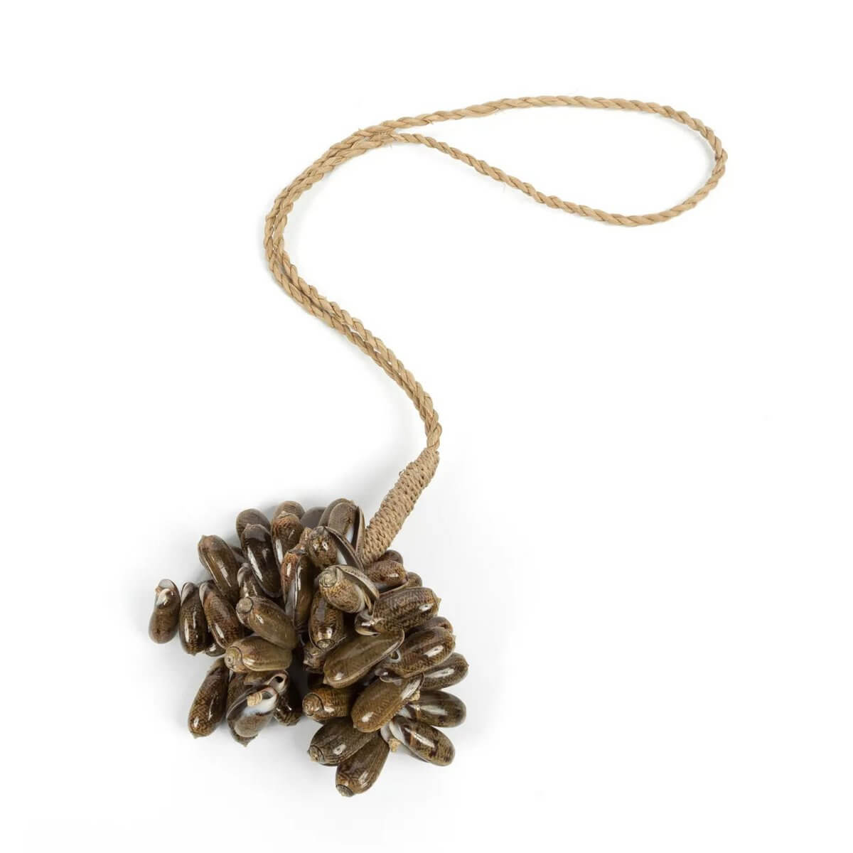"Bohemian brown kauri shell tassel, handmade by Balinese artisans, perfect for adding an exotic touch to home decor by Bazar Bizar Living."