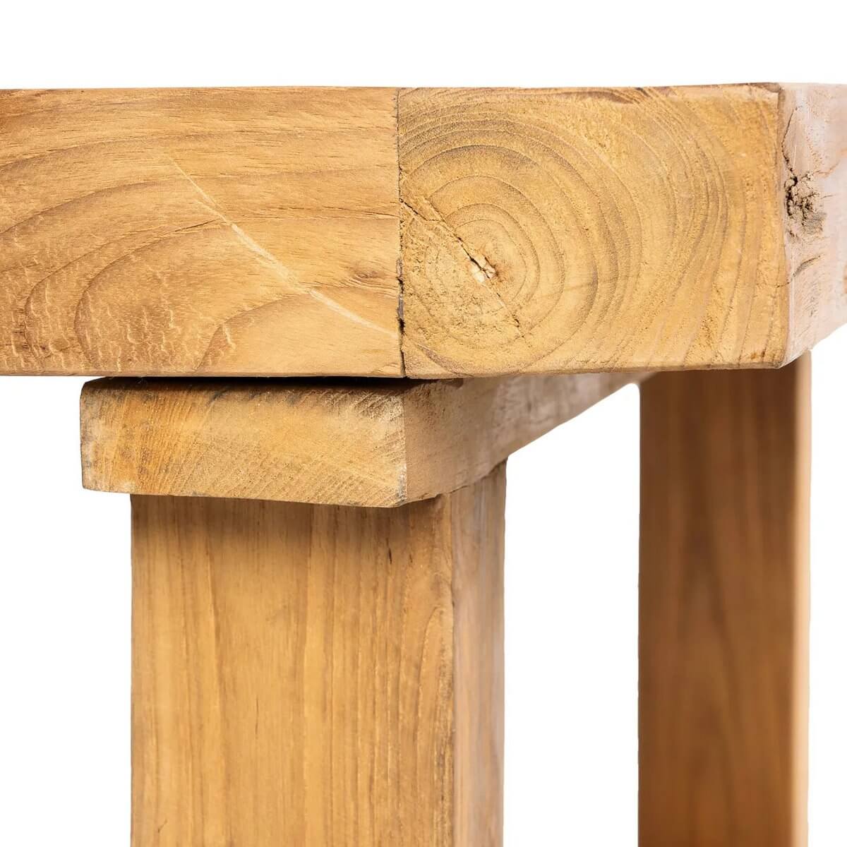 Close-up of a Bohemian style reclaimed teakwood coffee table with natural finish.