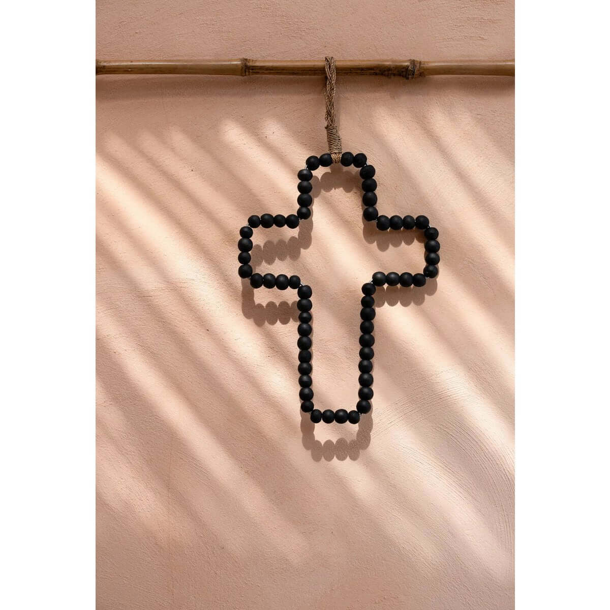 Bohemian black wooden bead cross hanging as wall decor, handmade from Bazar Bizar Living, 22x40cm, elegant and symbolic.