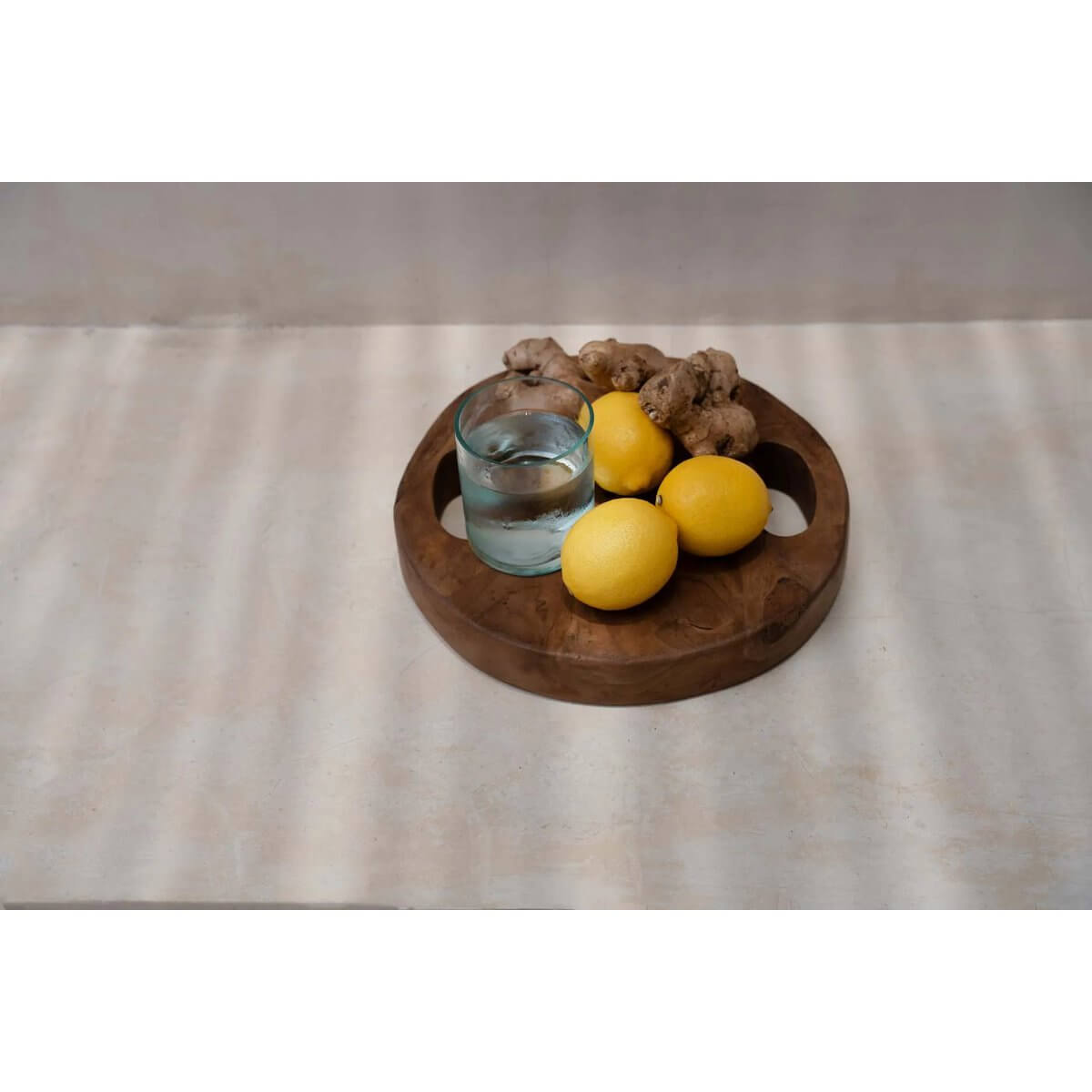 Bohemian On the Rocks-glas with lemons and ginger on wooden tray, showcasing unique recycled glass design for sustainable living.