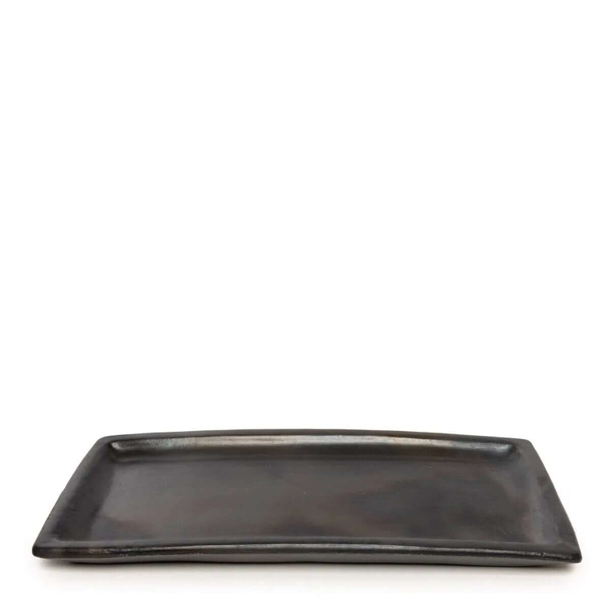 Bohemian-style black burned sushi board made of terracotta and earthenware from Bazar Bizar Living.