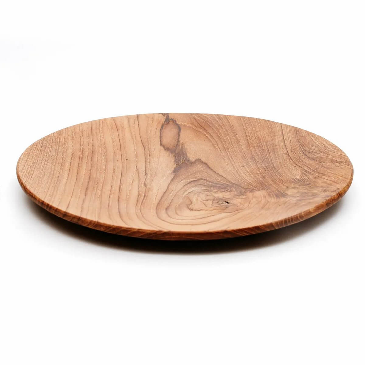 Teak root round plate with natural wood finish, versatile Bohemian decor piece, perfect for serving or as a decorative charger.