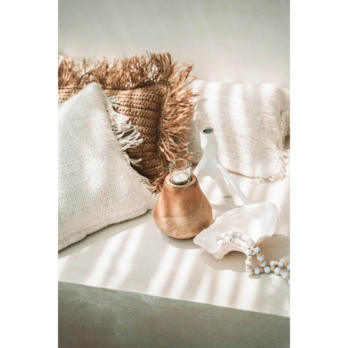 Cozy bohemian decor with a white Triple Twig Candle Holder, soft pillows, and natural elements creating a relaxing atmosphere.