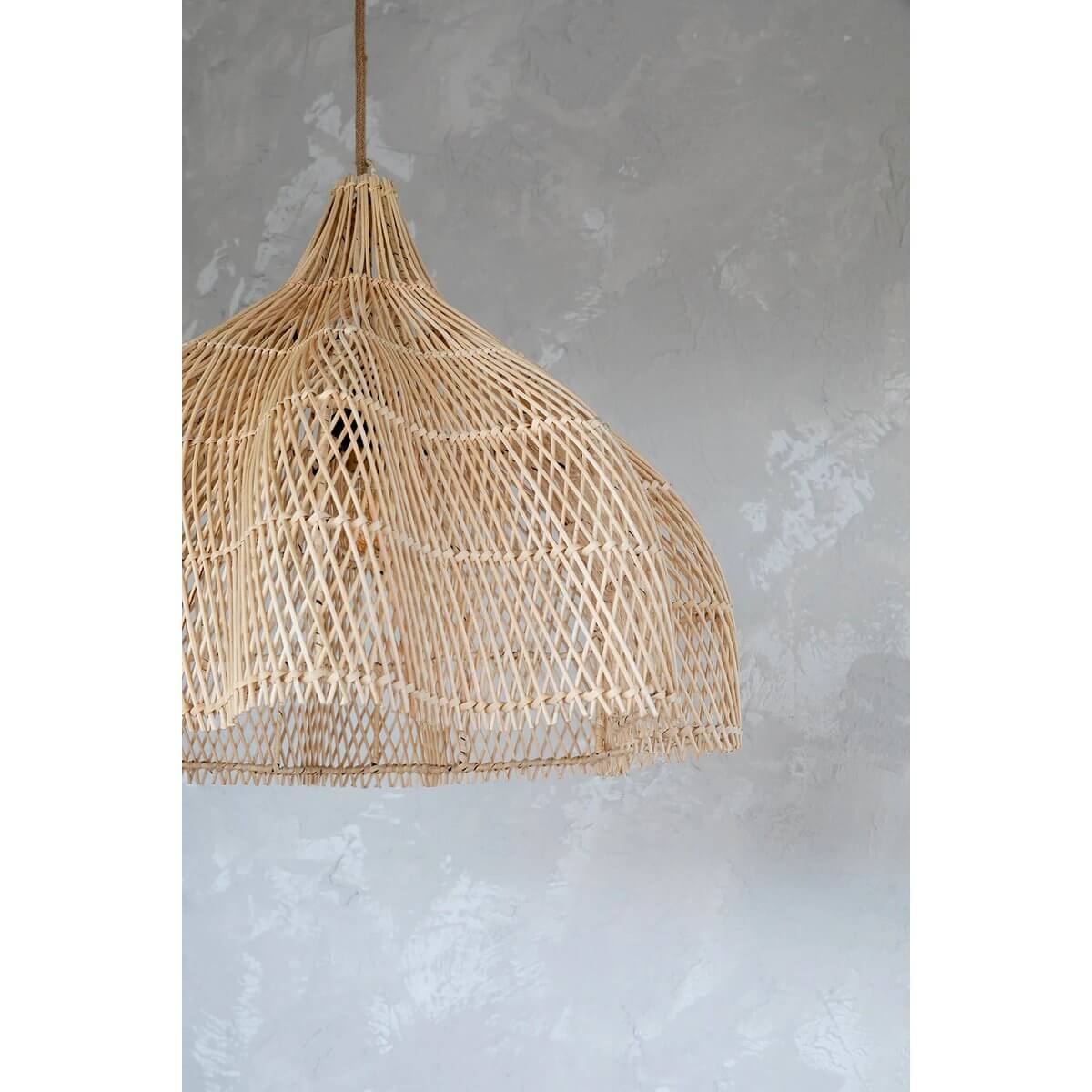 Bohemian-style rattan hanging lamp with unique design, perfect for indoor and outdoor covered areas, displayed against a neutral wall.