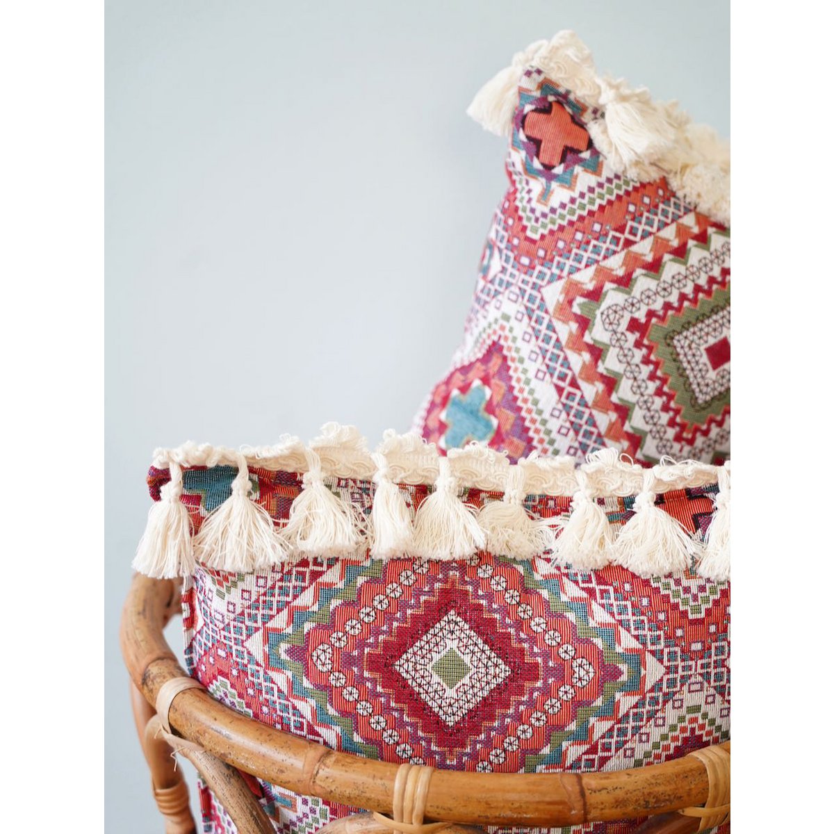 Decoratief kussen in 'roze bohostijl' met franjes