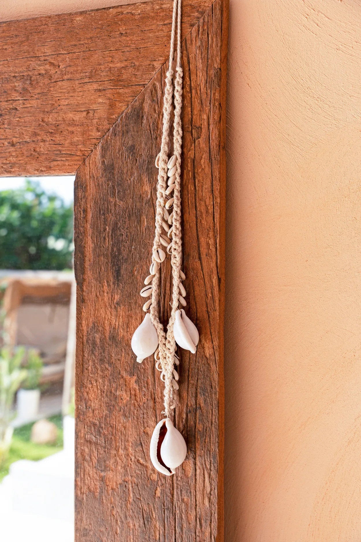 De grote witte kauri schelp ketting