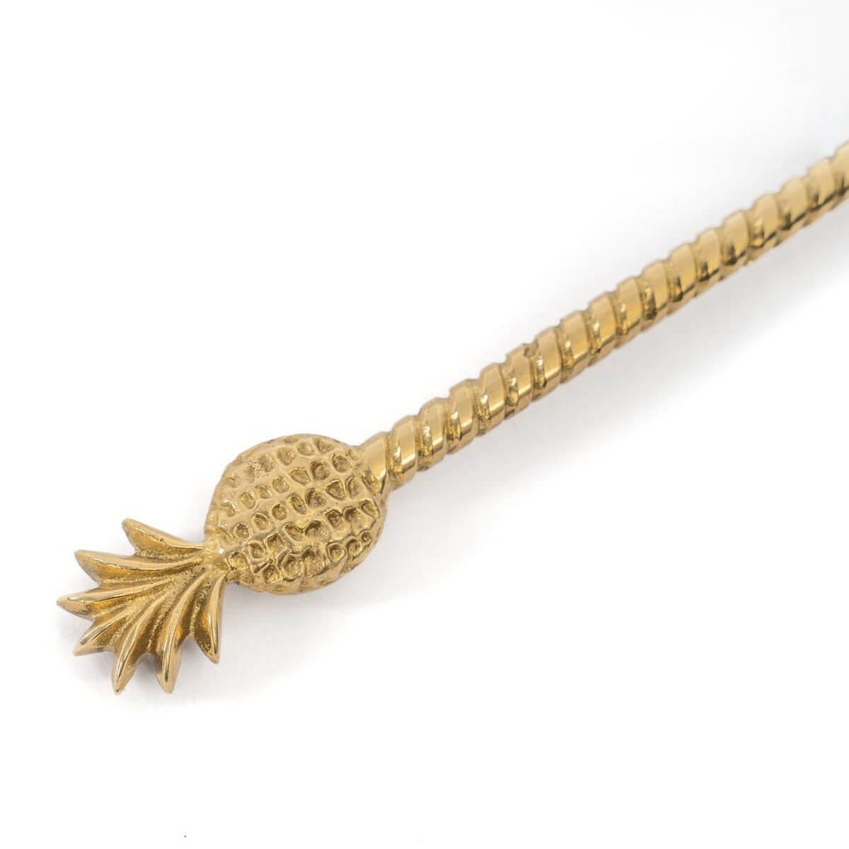 Golden pineapple-themed spoon from the Bohemian collection, crafted in solid brass, blending luxury and tropical elegance.