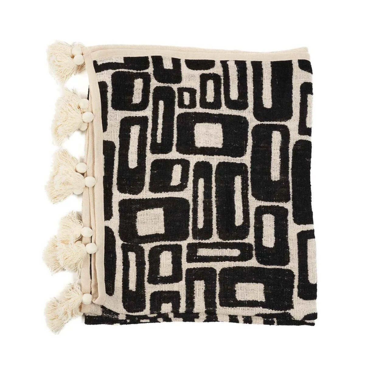 De Aztec Bedsprei in natuurlijk zwart met een stijlvol Azteeks patroon en kwastjes, perfect voor moderne interieurs. Katoen, Bazar Bizar.