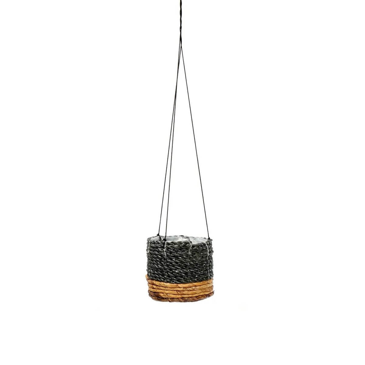 Bohemian black and natural hanging plant holder made from banana leaf and seagrass, perfect for stylish indoor plants.