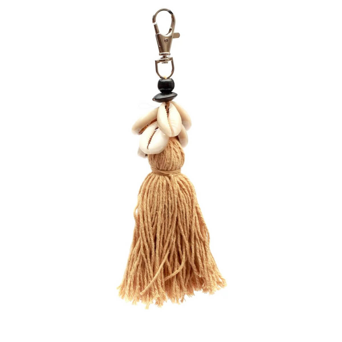 Bohemian Mocca De Cowrie Tassel Keychain with cotton tassels and porcelain shells, perfect for adding coastal charm to keys or bags.