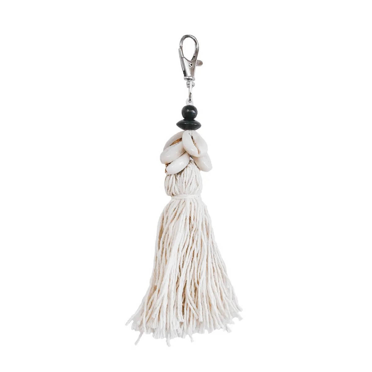 Bohemian style keychain with cowrie shells and cotton tassel, perfect for decoration or gifting.
