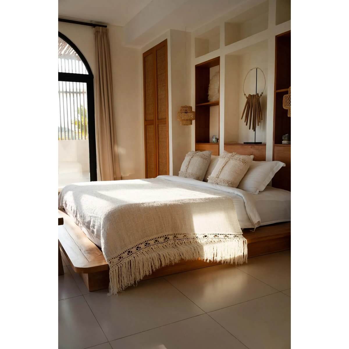 Cozy bedroom with the De Gypsy Bedsprei in natural color, featuring a bohemian style throw, enhancing the room's modern-boho ambiance.