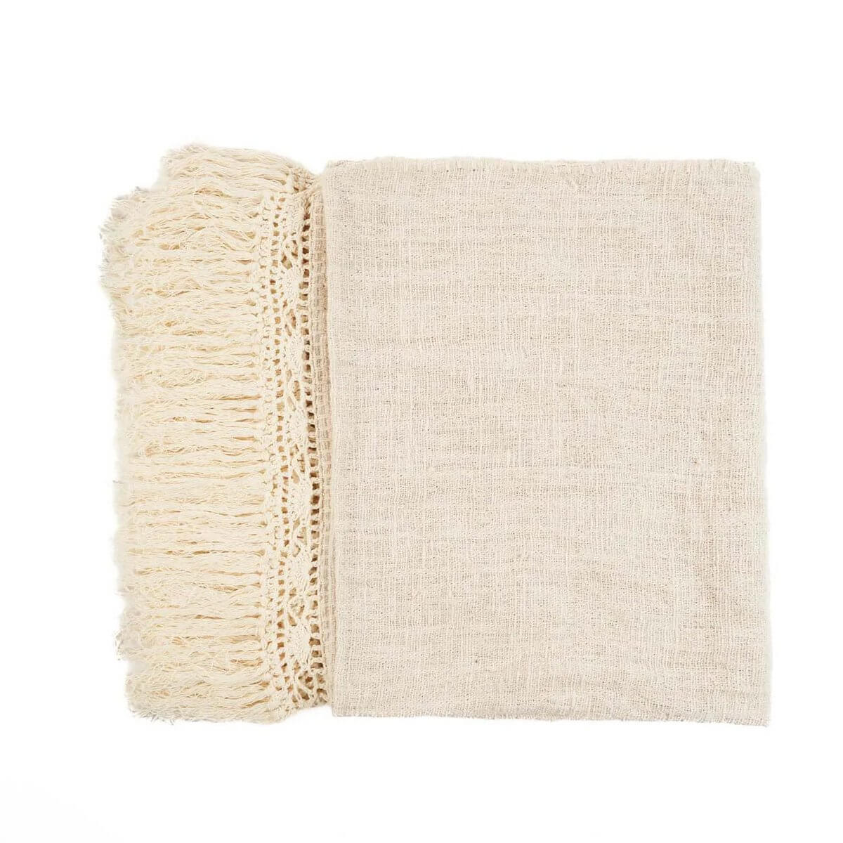 Bohemian-style beige Gypsy Bedsprei with fringed edges, a perfect cosy and stylish addition to any home decor.