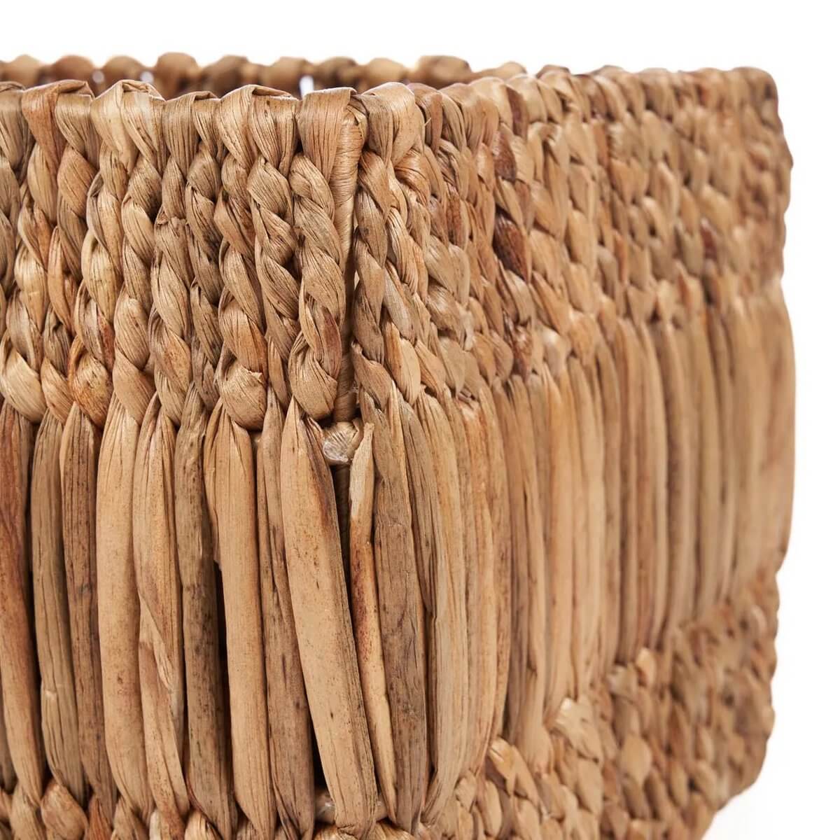 Bohemian style Akuku Basket, handcrafted from sustainable banana leaf, showcasing rustic, organic texture.