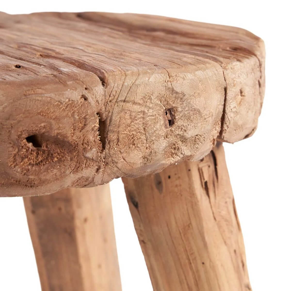 Close-up of a rustic De Marabunta side table showcasing natural wood texture, perfect for a bohemian style in any room.
