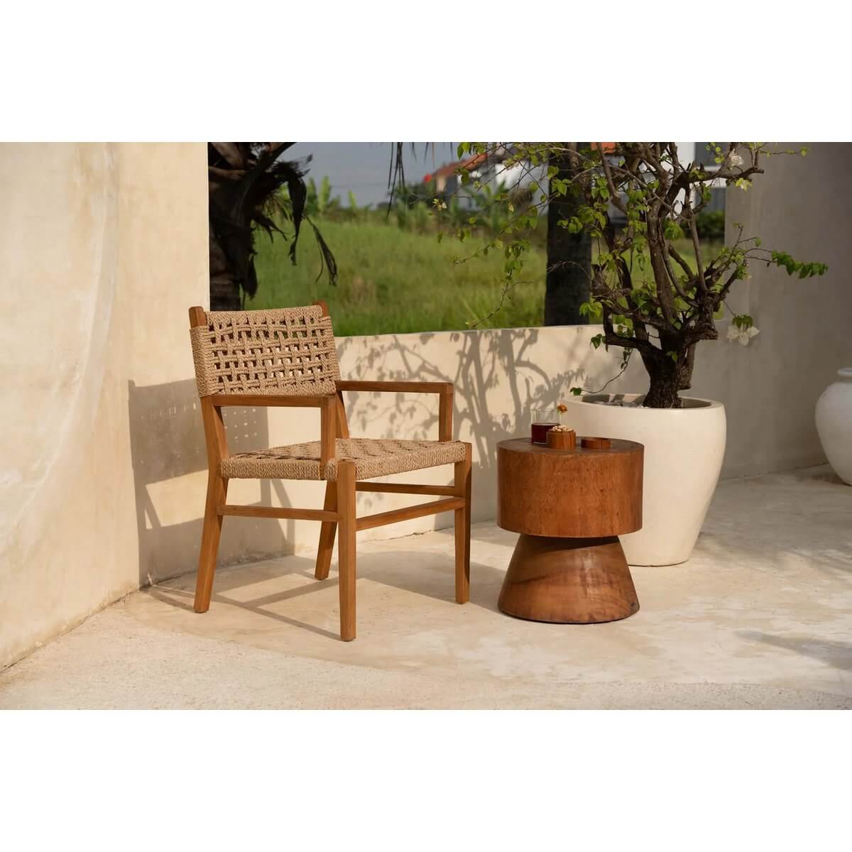 Bohemian-style De Mitcha Kruk as a modern side table in a natural setting, showcasing minimalistic design and quality materials.