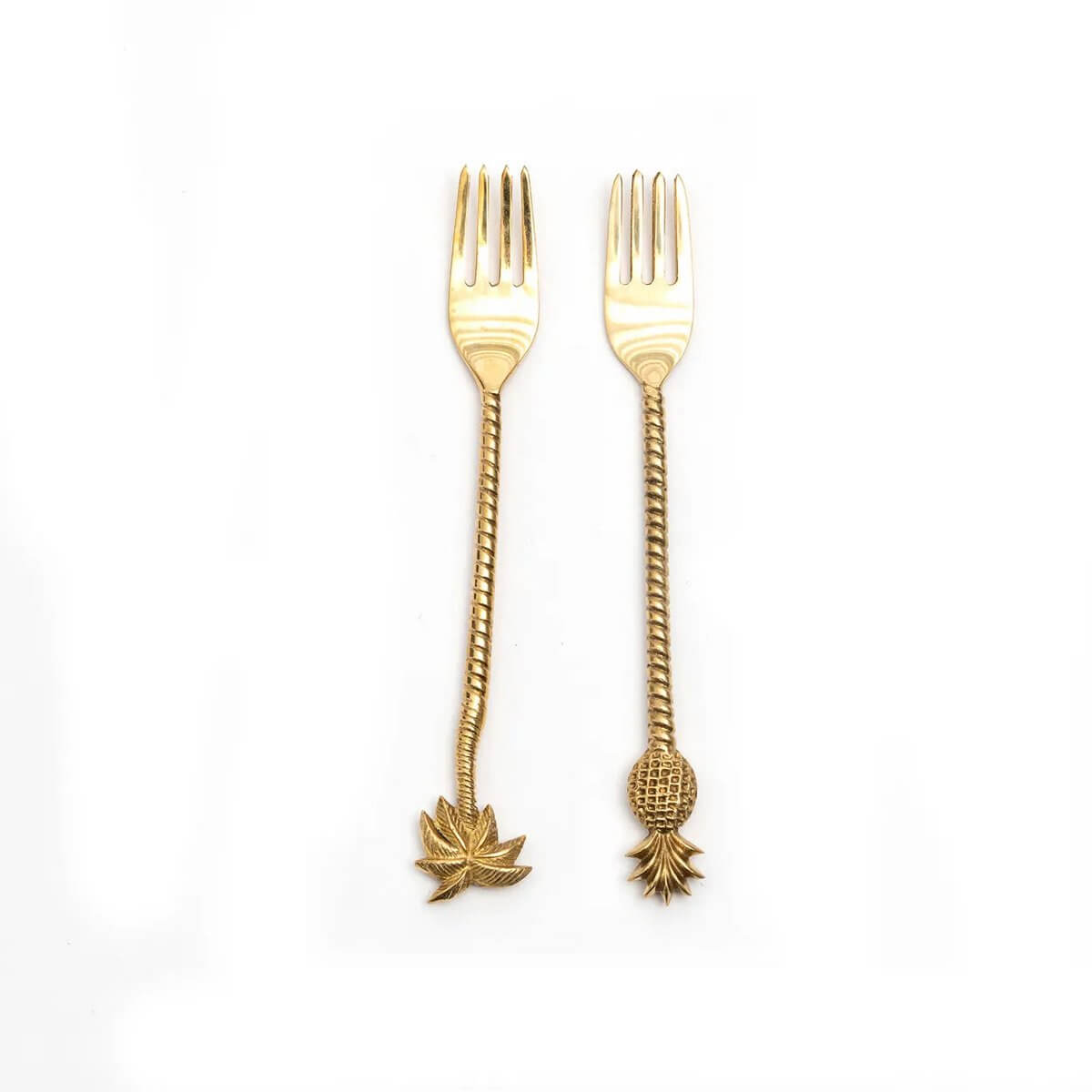 Golden palm tree and pineapple forks, bohemian style, luxurious solid brass cutlery with intricate details, perfect for elegant dining.