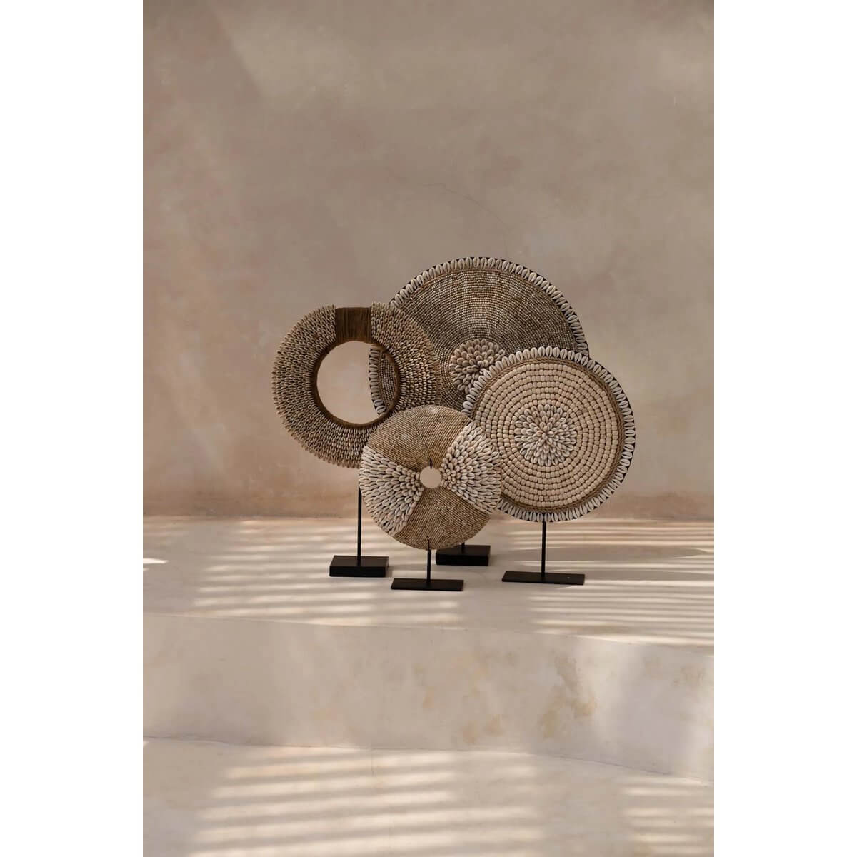 Elegant seashell-inspired decor on stand in natural white hue, perfect for adding coastal charm to your home. Handcrafted and unique.