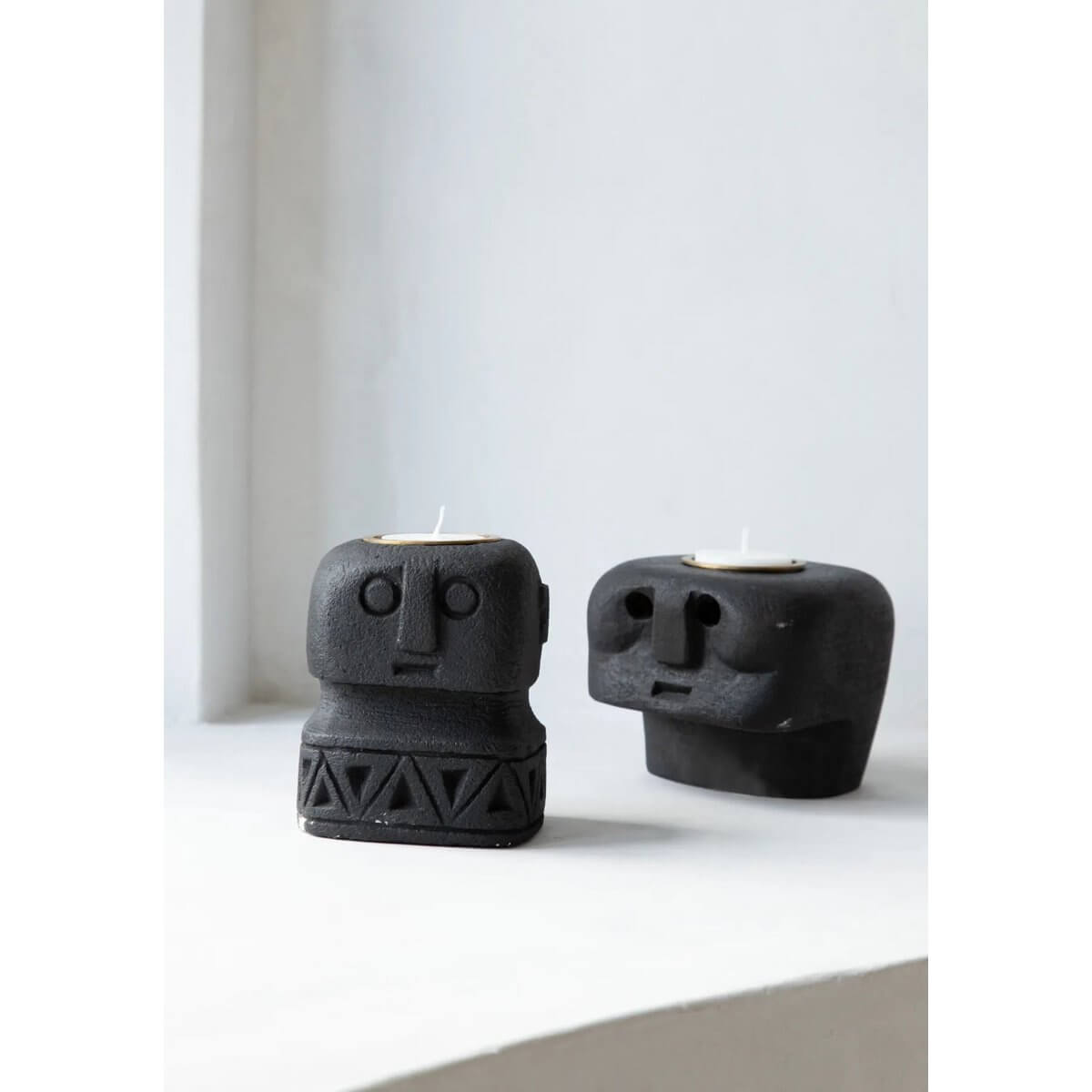 Bohemian style De Sumba Steen #26 candleholders handcrafted from sandstone, adding rustic charm and cultural flair to any decor.