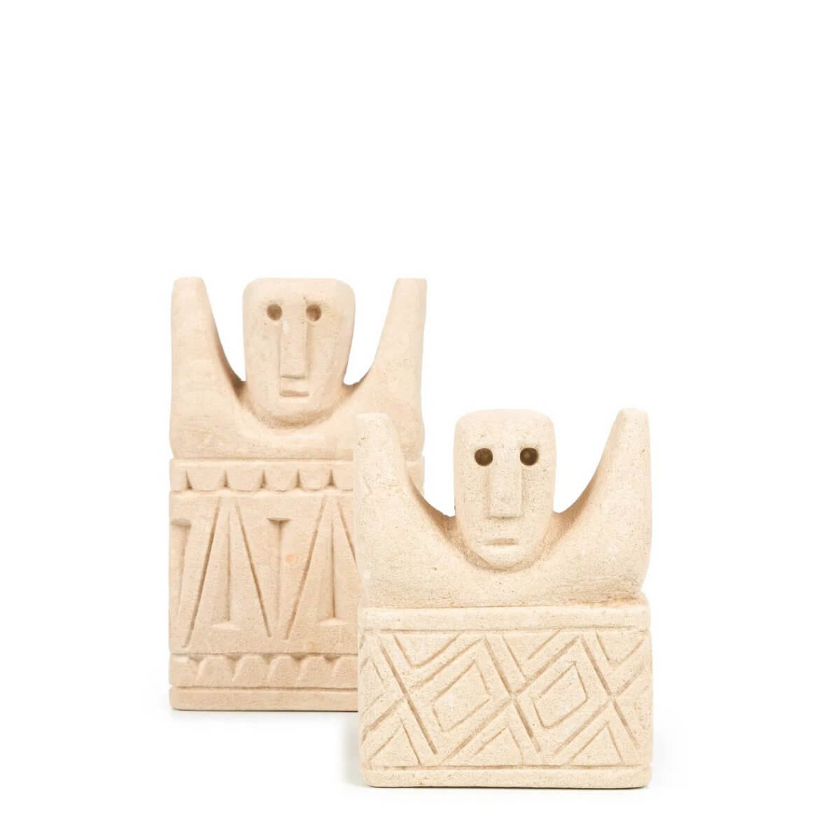 Bohemian Sumba sandstone statues handcrafted in Indonesia, offering a rustic and protective charm for modern home decor.