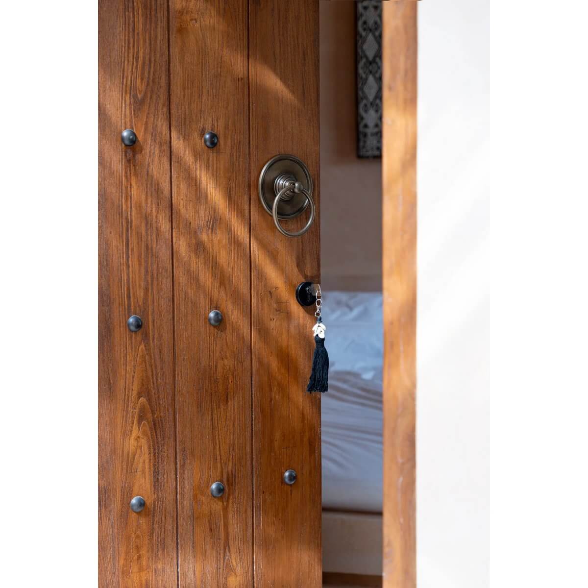 De Sumbawa sleutelhanger - zwartbruin