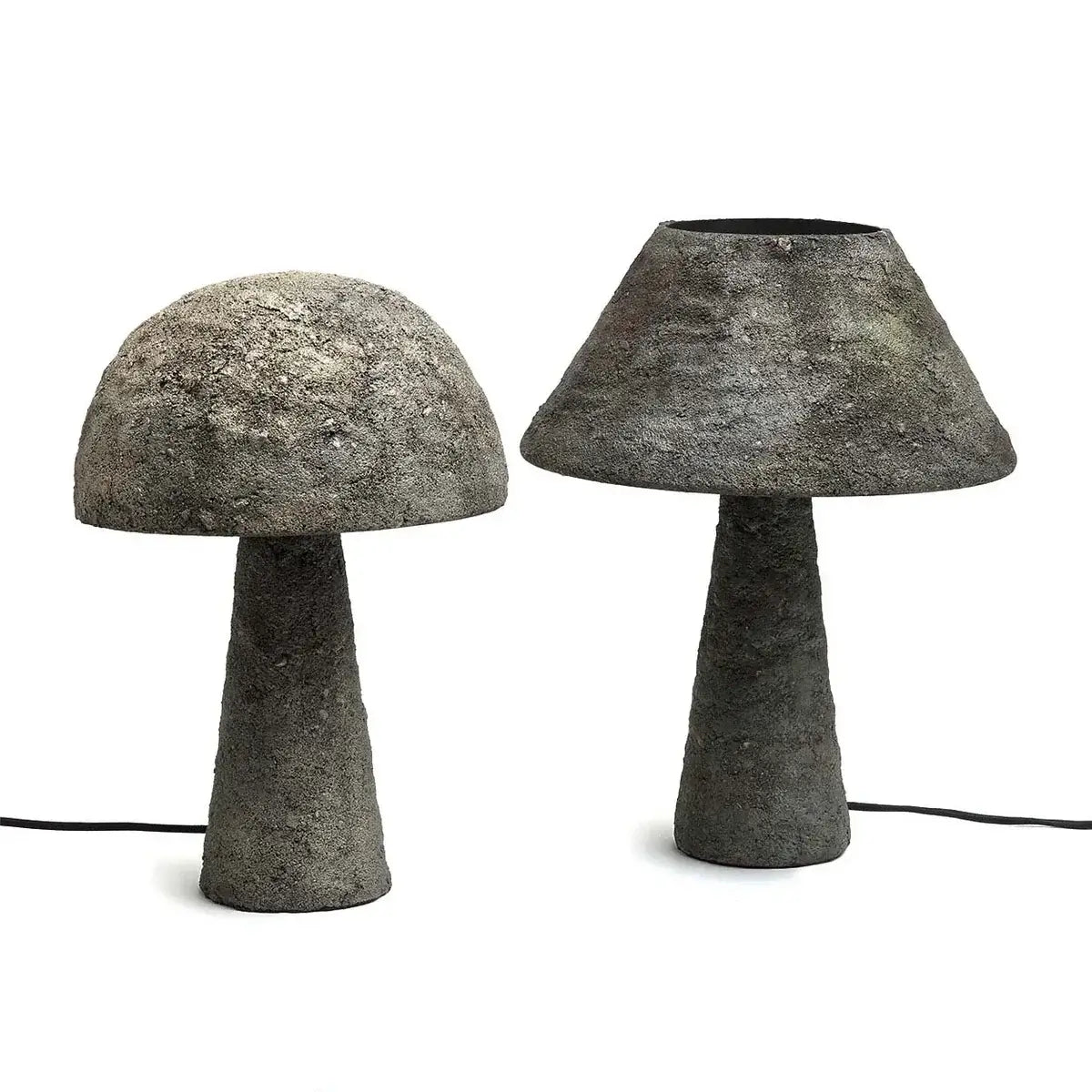 Concrete cosy table lamps with a warm glow, perfect for modern or minimalist decor, featuring sturdy bases made of concrete.