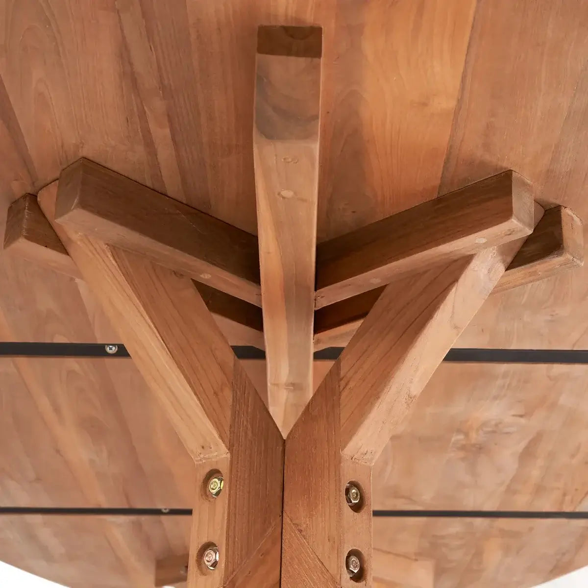 Close-up of the underside of the De colormed Berman Revil table, showcasing eco-friendly upcycled teak wood and bohemian style.