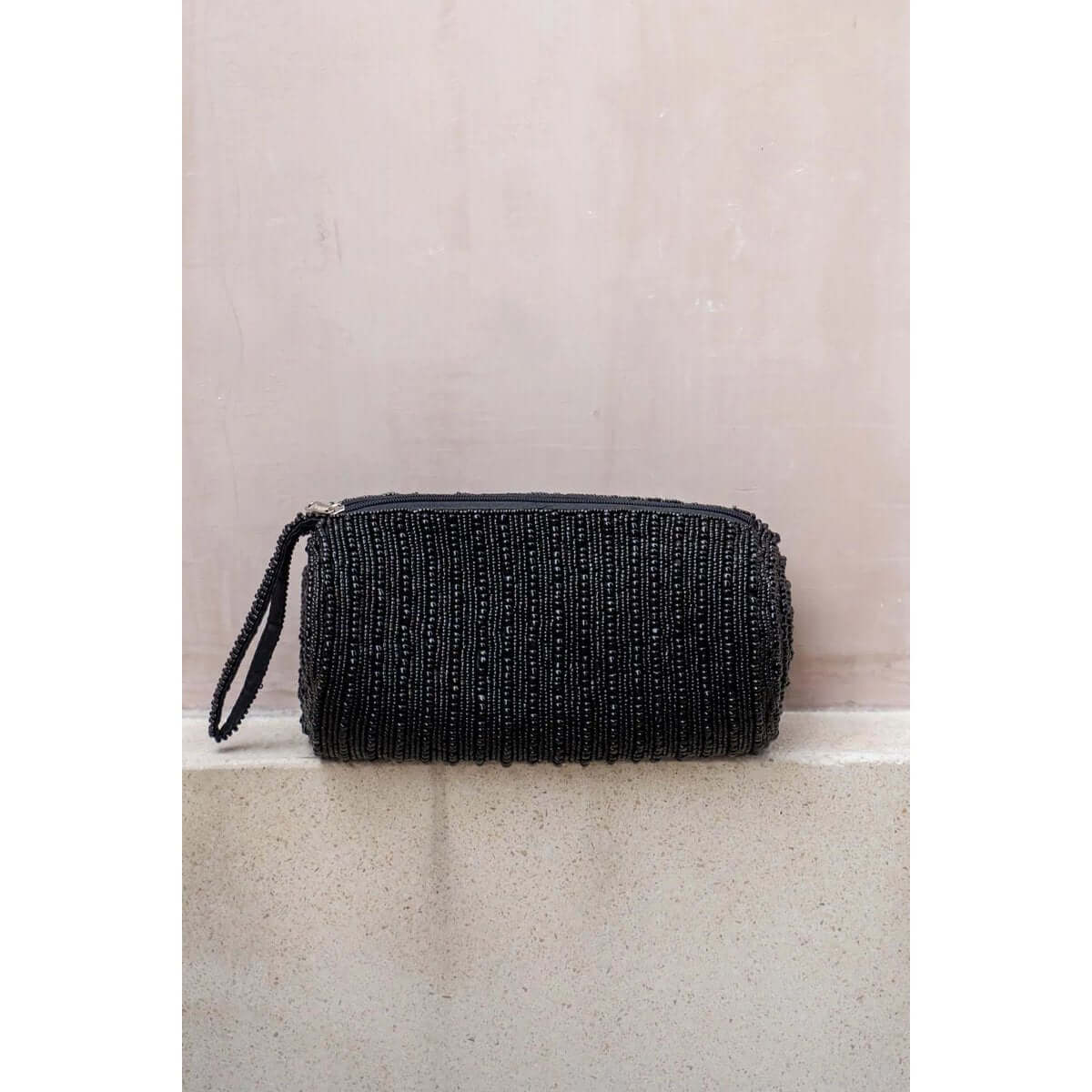 Bohemian black pencil case, perfect for organizing pens, makeup, and more. Say goodbye to clutter with this stylish accessory.