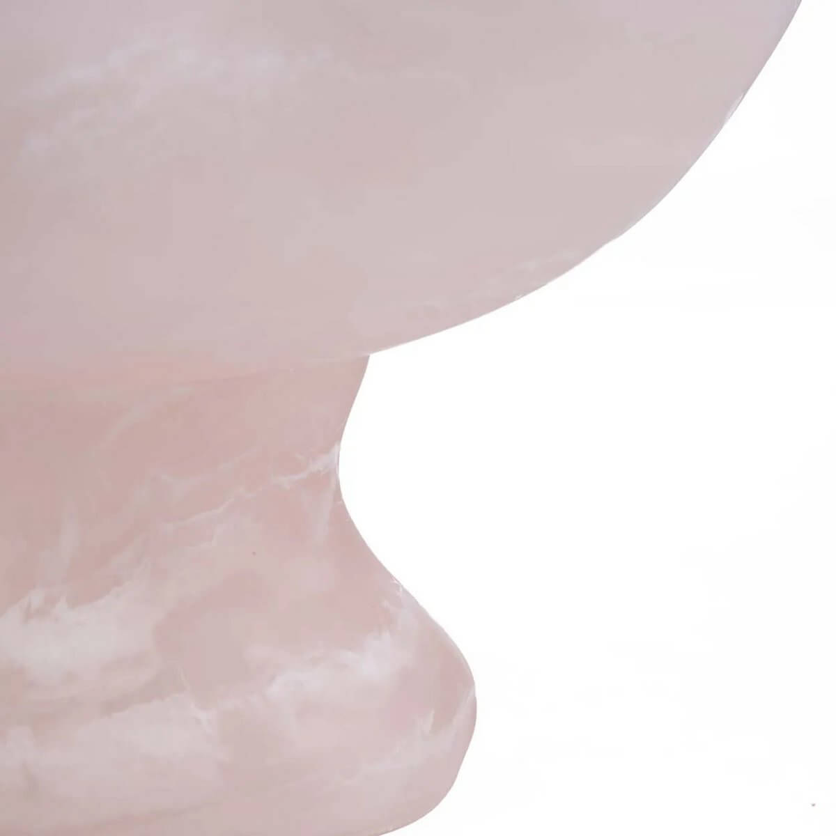 Close-up of a pink and white bohemian resin fruit stand with elegant, flowing lines, adding modern charm to your kitchen or dining room.