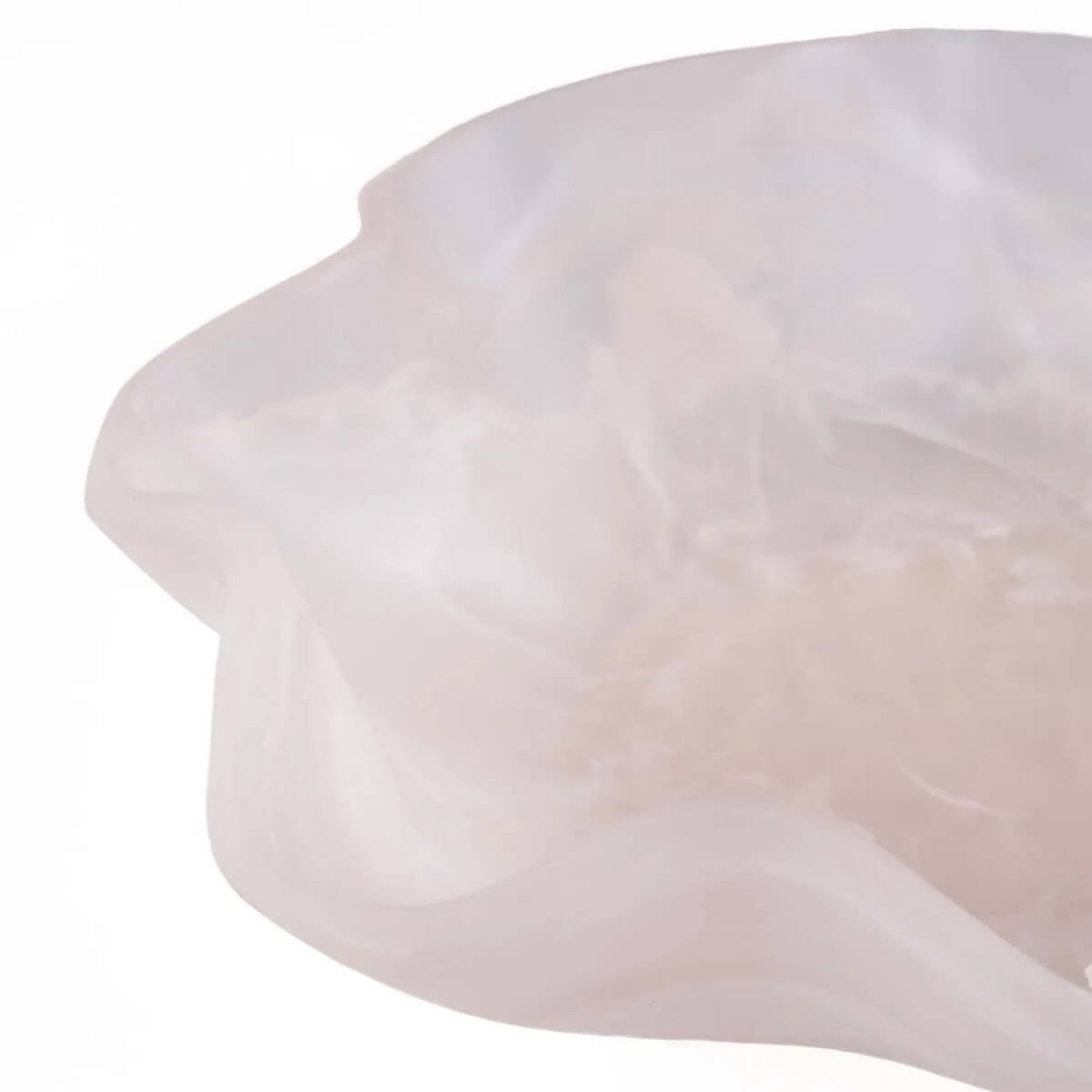 Bohemian-style pink and white resin fruit bowl with organic design, perfect for modern kitchens.