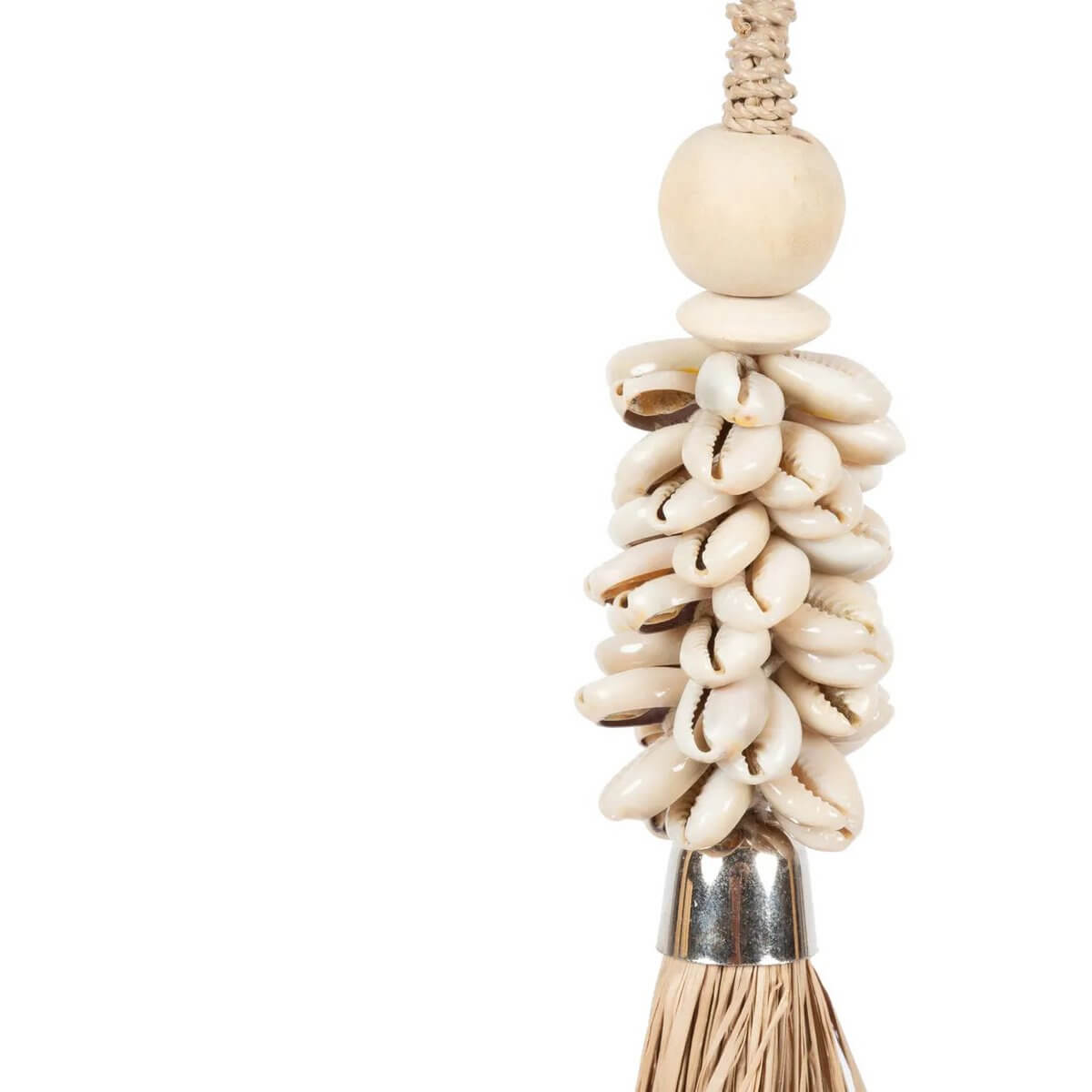 Handmade kauri shell and raffia tassel from Bali, perfect for bohemian decor, can be hung on doors or curtains. Bazar Bizar Living product.